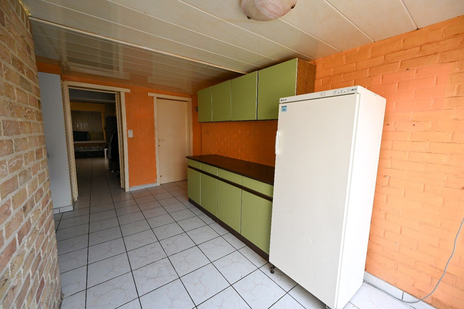 TE RENOVEREN STADSWONING MET ZONNIGE TUIN OP TOPLIGGING foto 3