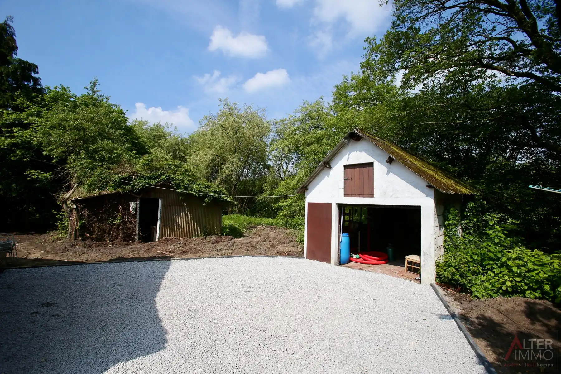 Gelijkvloerse woning (1970) met 2 slaapkamers, kelder en zolder (mogelijks in te richten) op perceel van 10a 30ca. foto 16
