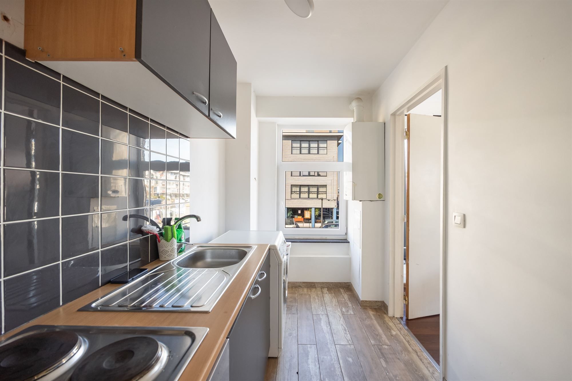 Lichtrijk hoekappartement met 1 slaapkamer foto 3