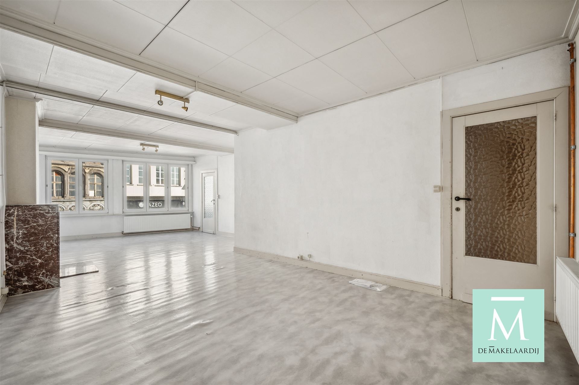 Appartementsgebouw met handelspand op het gelijkvloers foto 18