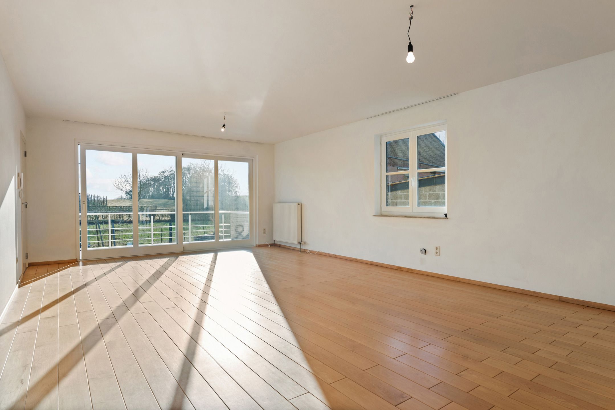 Gelijkvloersapp. met ruime garage te Heukelom foto 3