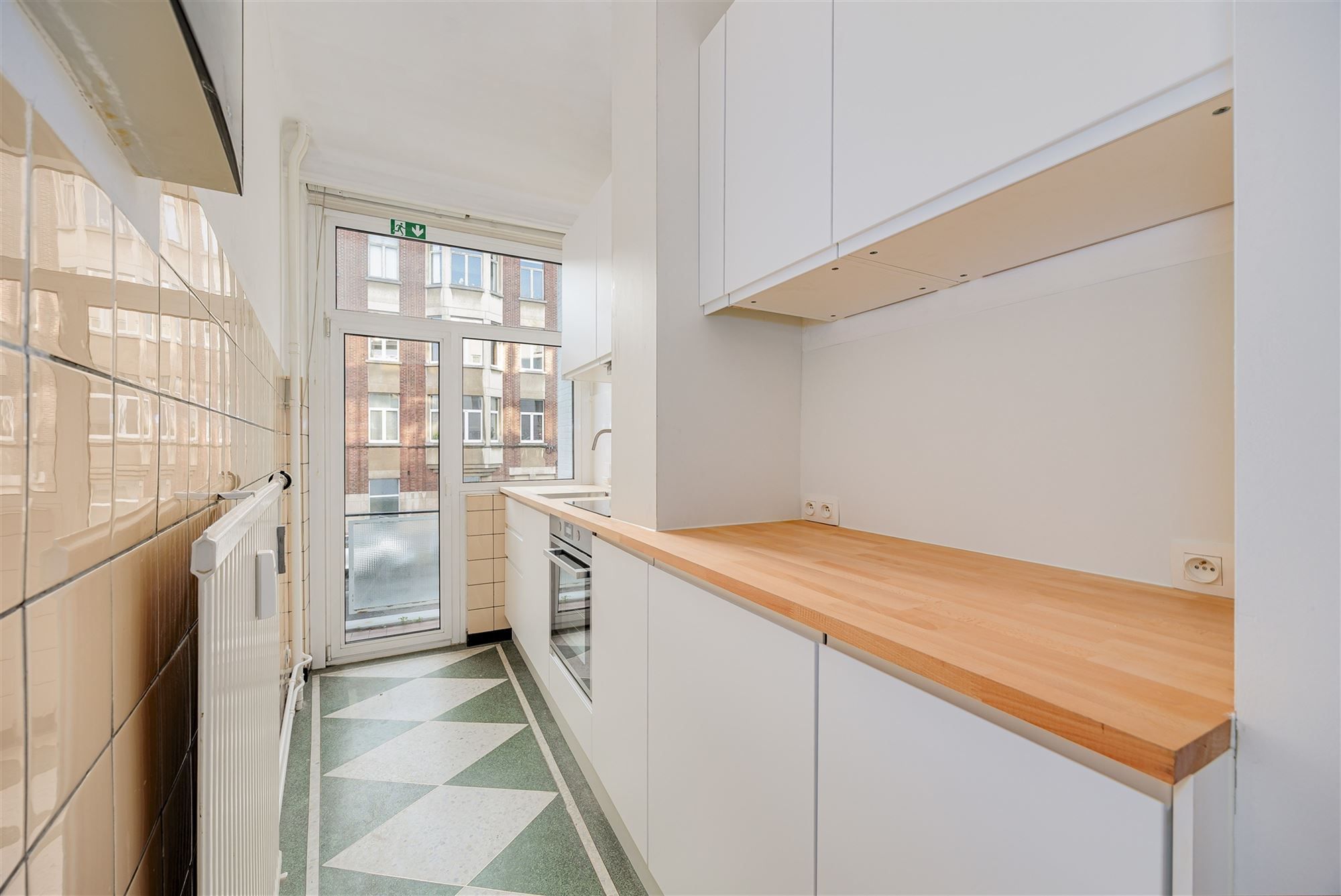 Stijvol appartement met 2 slpk en P foto 6