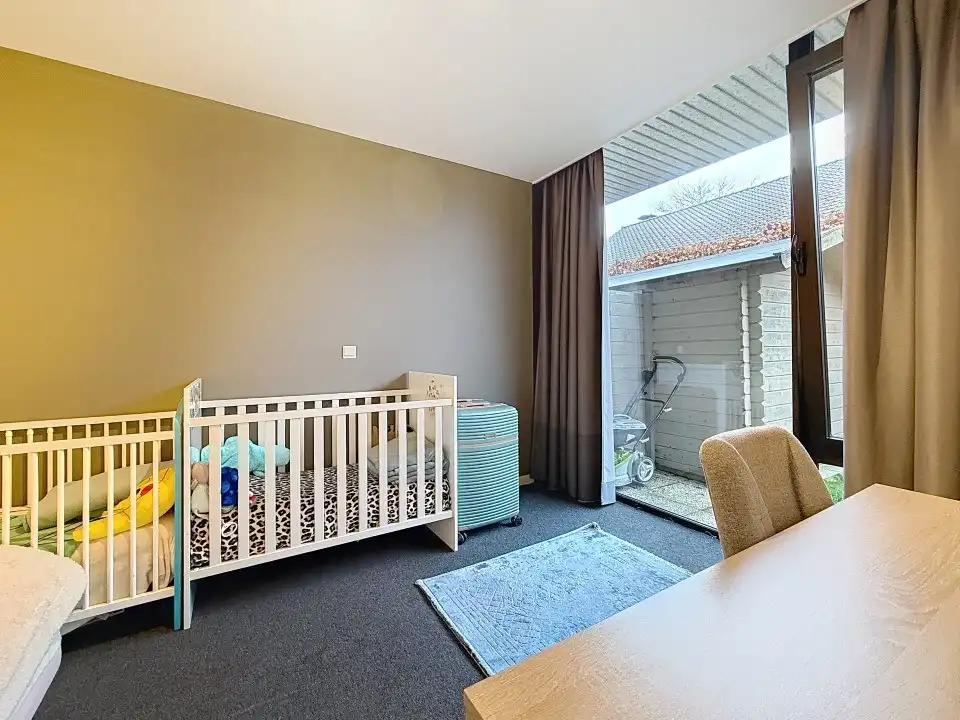 Centraal gelegen gelijkvloers appartement met tuin en garage foto 5