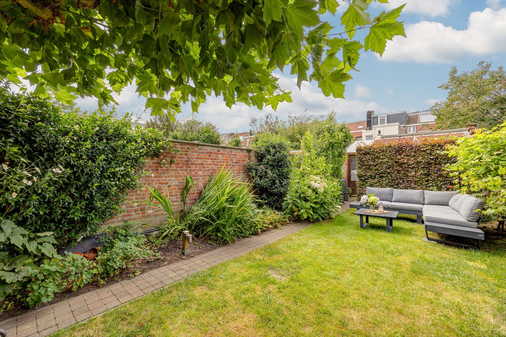 Karaktervolle woning met 4 slaapkamers en zonnige tuin foto 12