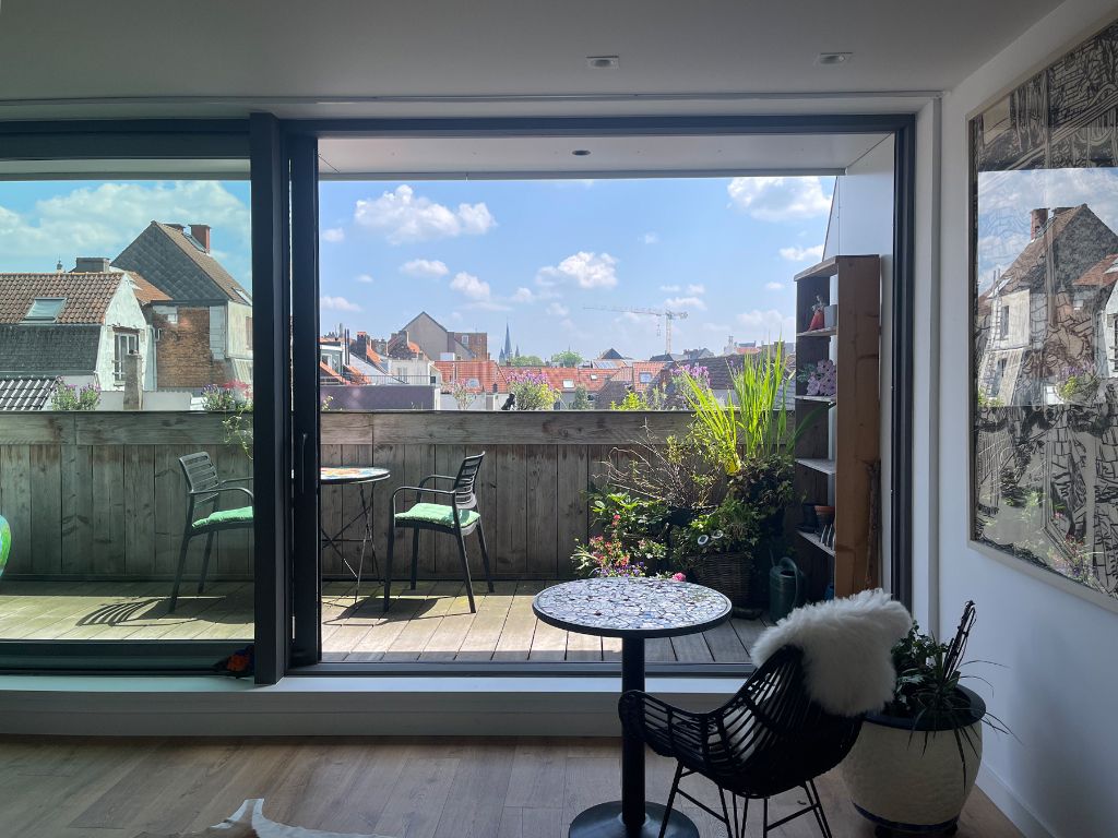 Duplex appartement (bj 2020) met een groot terras en aantrekkelijk zicht op de torens van Gent. foto 4