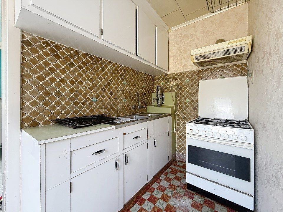 Half-open woning met 2 slaapkamers, garage en tuin foto 4