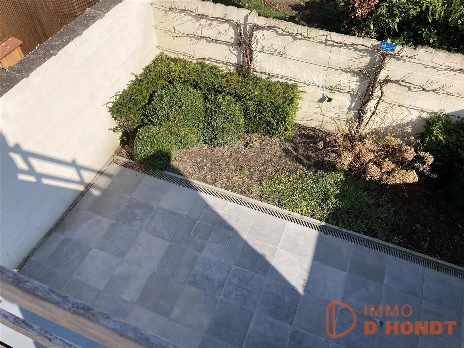 Stadswoning met tuin, terras en garage foto 22