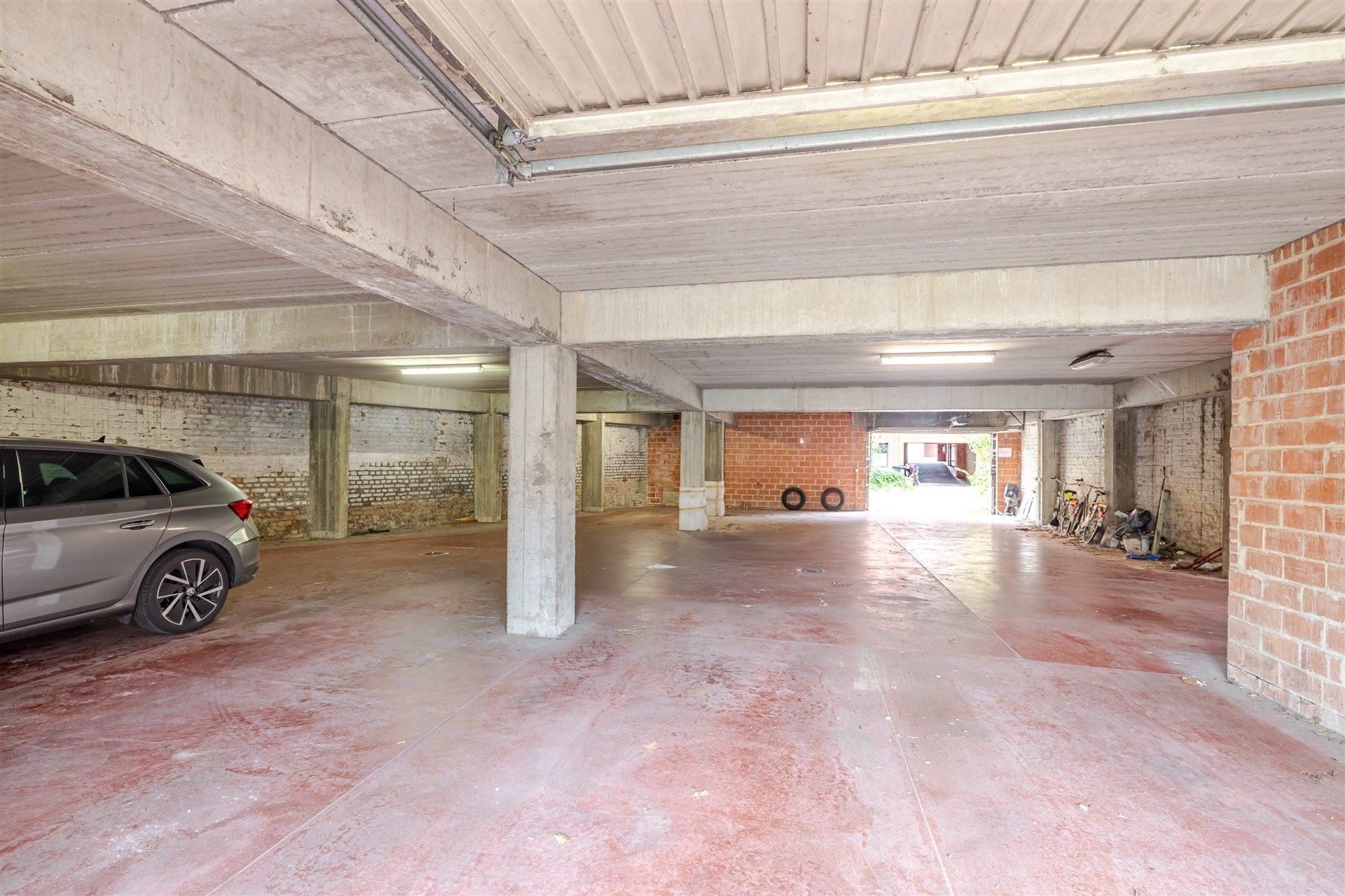 Opbrengsteigendom bestaande uit 4 appartementen + 22 garageboxen + magazijn/werkplaats foto 24