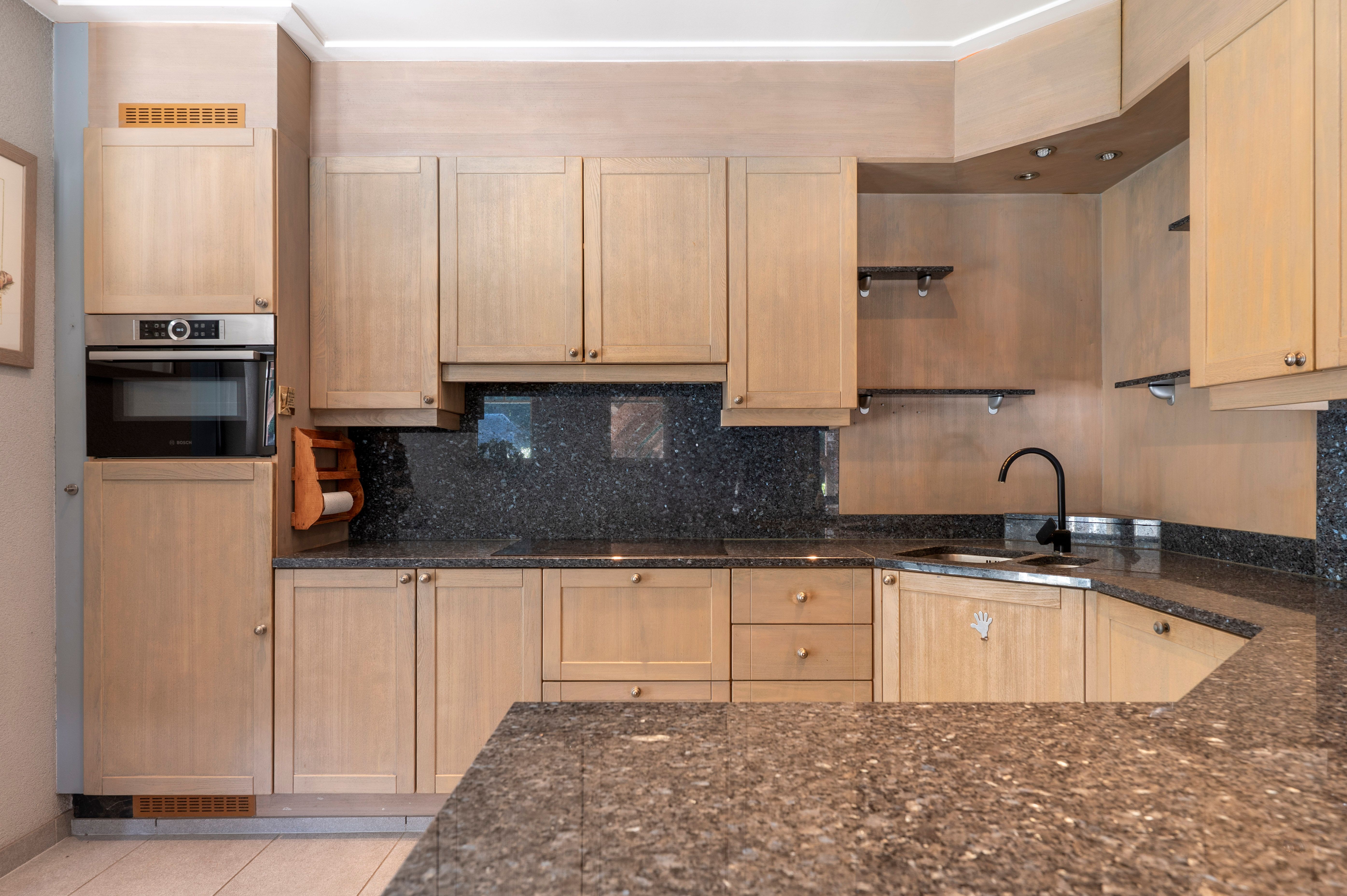 Instapklare laagbouwvilla nabij het centrum van Brasschaat. foto 11