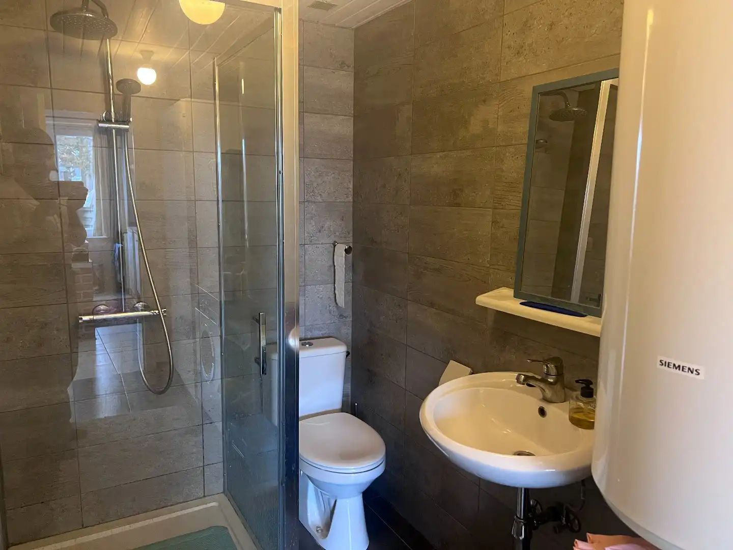 Woning met gezellig tuintje en privatieve staanplaats te huur in De Haan! foto 13