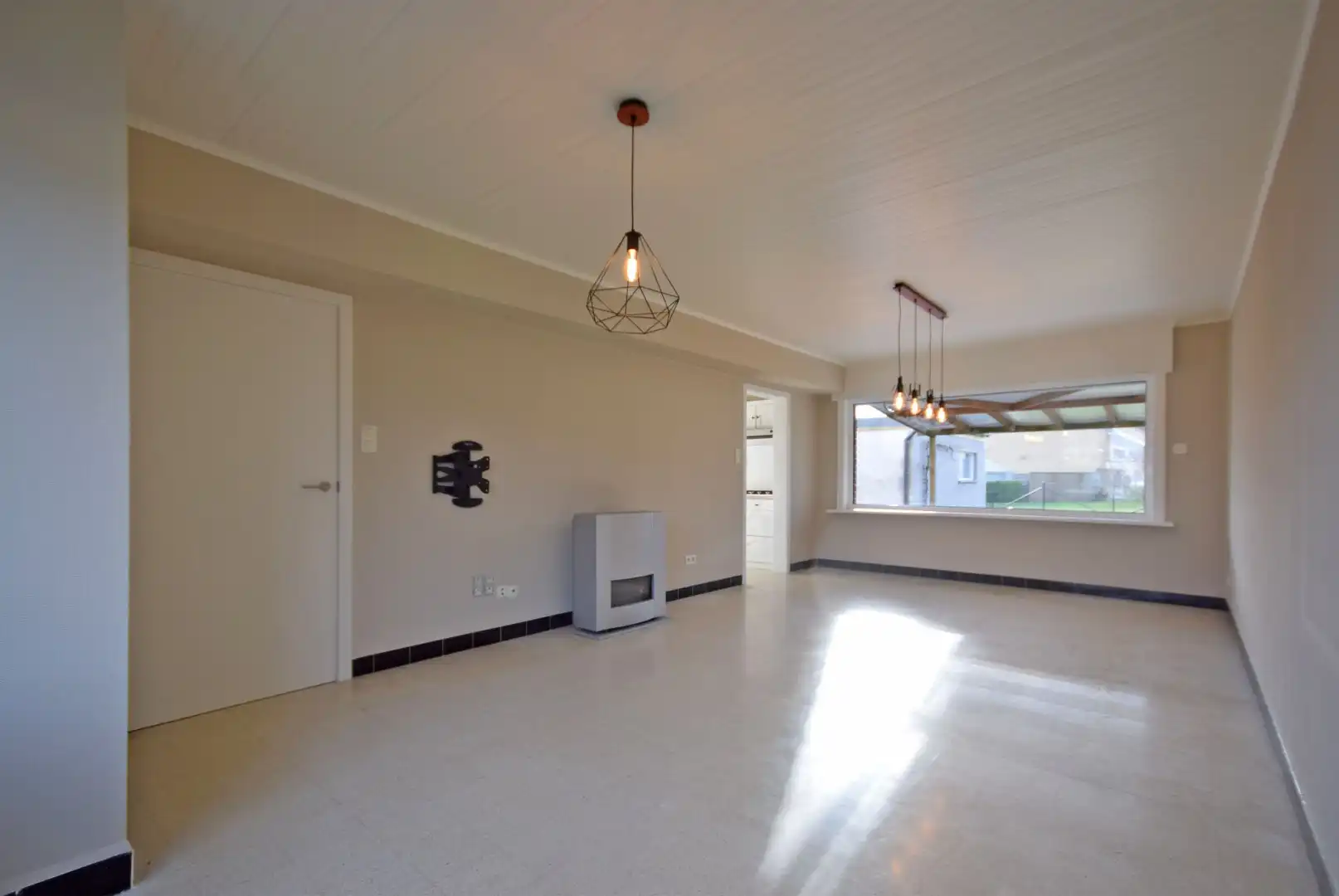 Ruime rijwoning met tuin foto 2