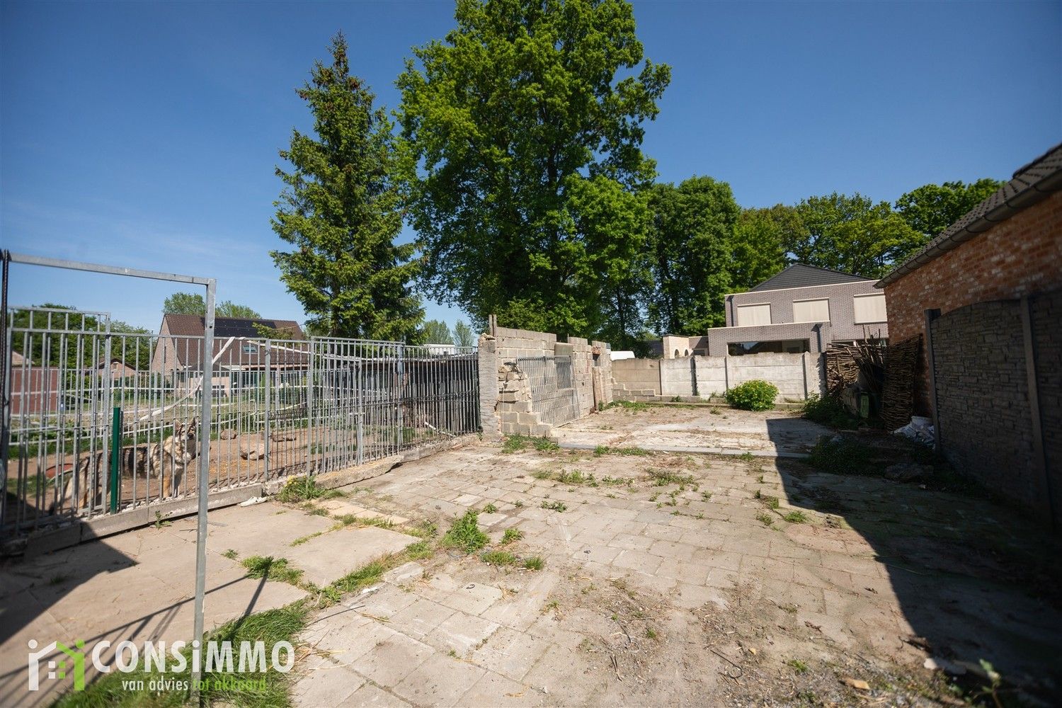 Gelijkvloerse woning met veel potentieel - vergunde nieuwbouwmogelijkheid in Genk foto 16