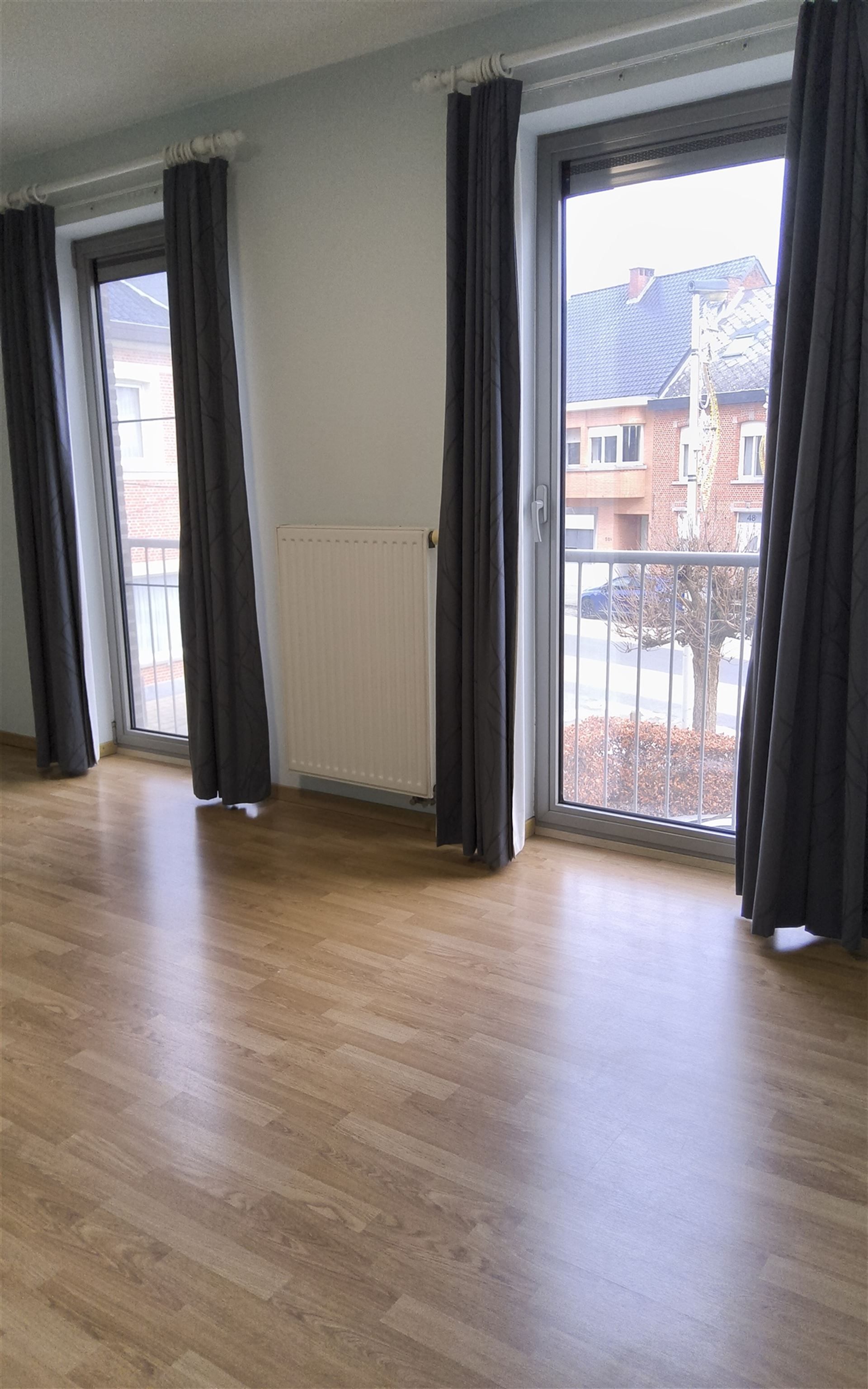 Ruim 2 slaapkamer-appartement met garage foto 22