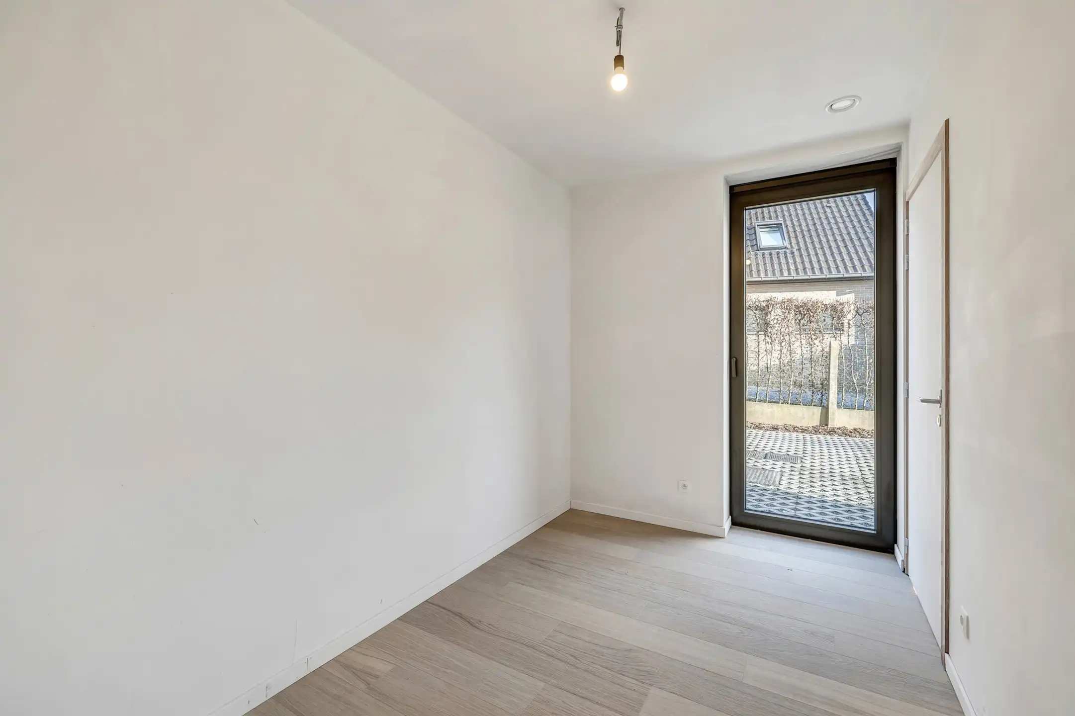 Gelijkvloers appartement met 2 slpks in uniek woonerf foto 11