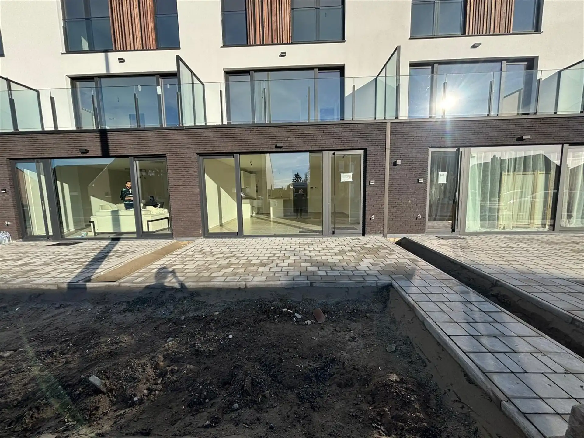 Modern gelijkvloers appartement met private tuin en ruime terrassen in Asse! foto 2