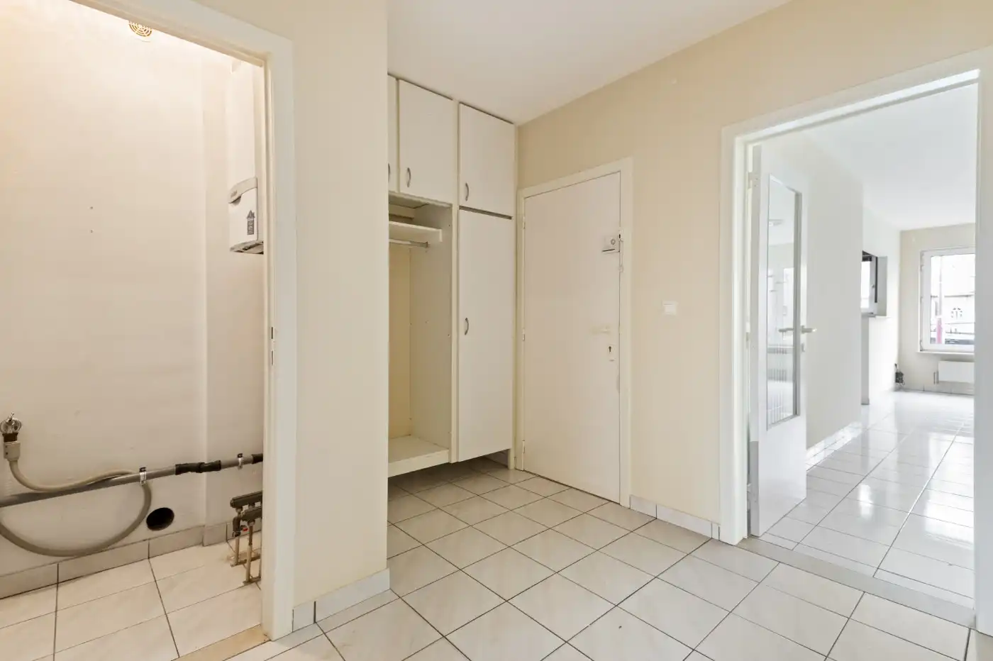 Tof, gelijkvloers, 2 slpk.-appt met privatief tuintje en ruime garagebox + staanplaats foto 18