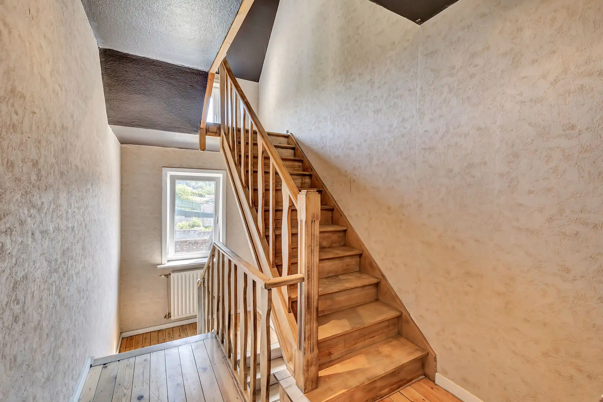 Instapklaar triplex of opbrengsteigendom met 4 slpks 2 badk foto 9