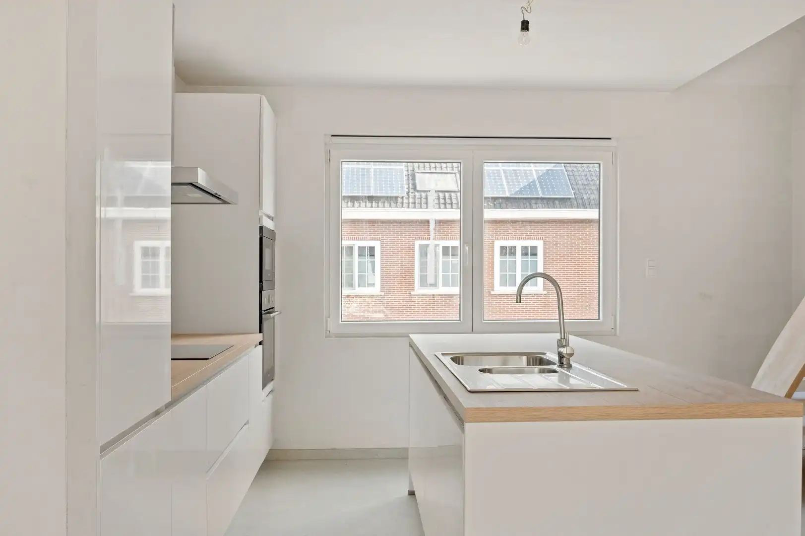 DUPLEX NIEUWBOUWAPPARTEMENT MET 2 SLPKS EN RUIM TERRAS TE GELUWE foto 8