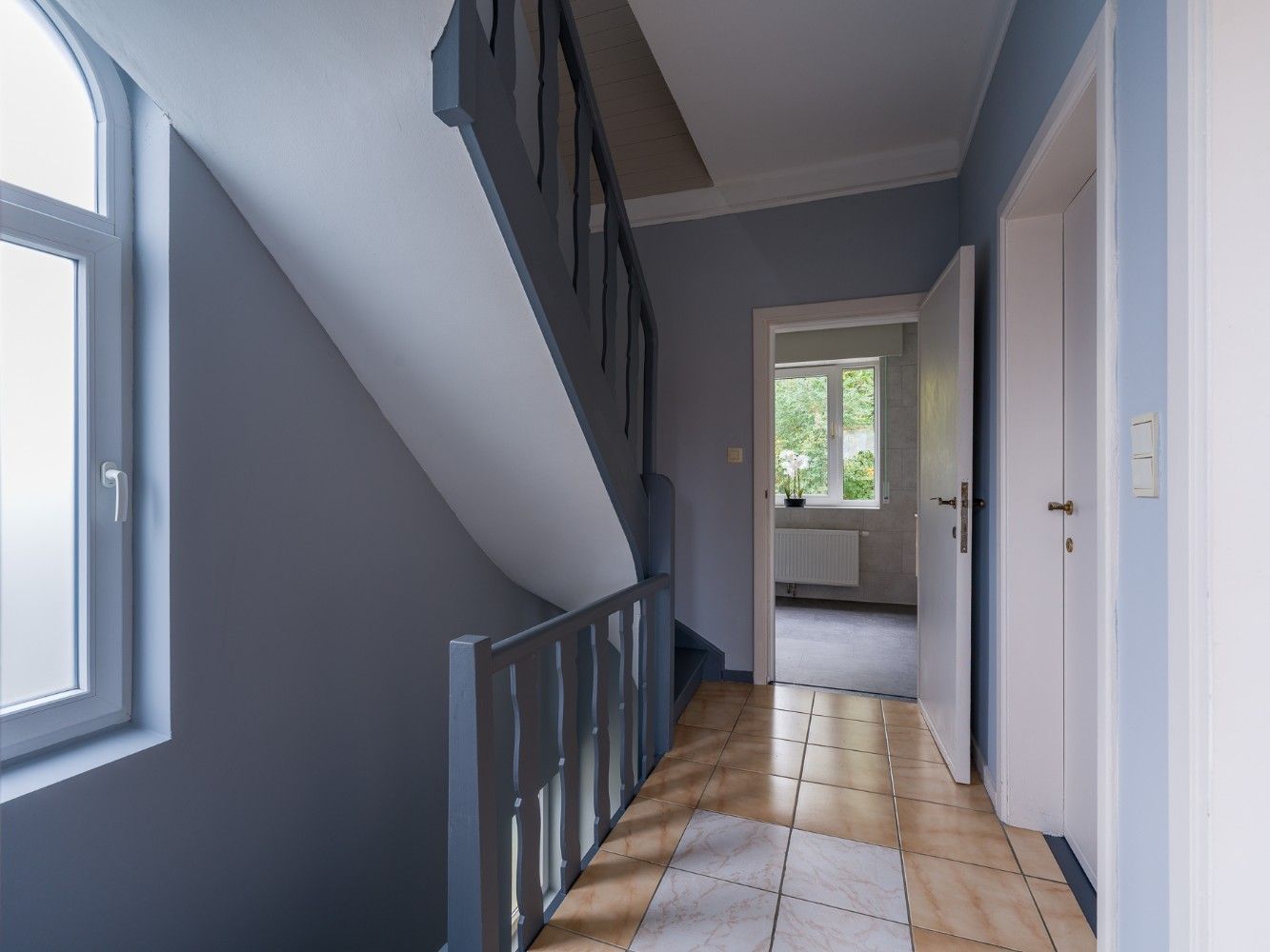 Ruime, instapklare woning met 4 slpk., inpandige garage en tuin foto 18