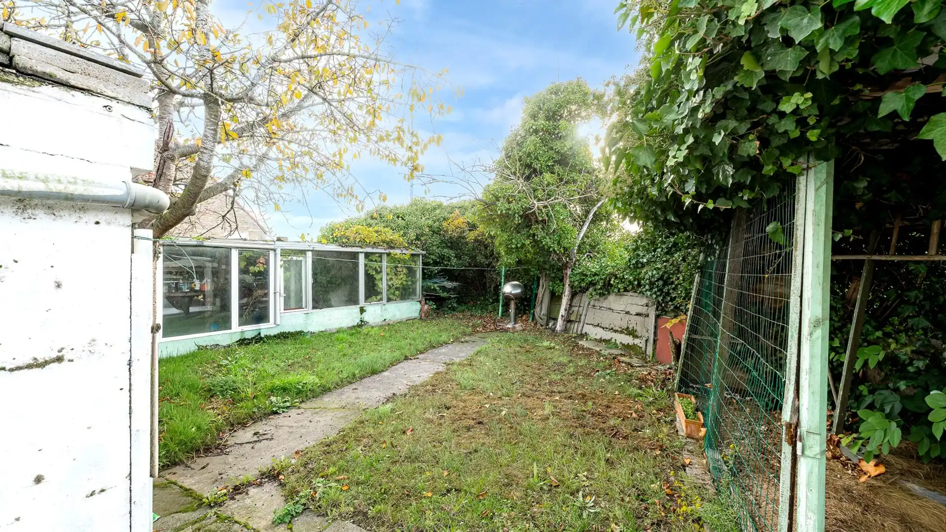 Te renoveren woning op een mooi perceel te Lissewege foto 5