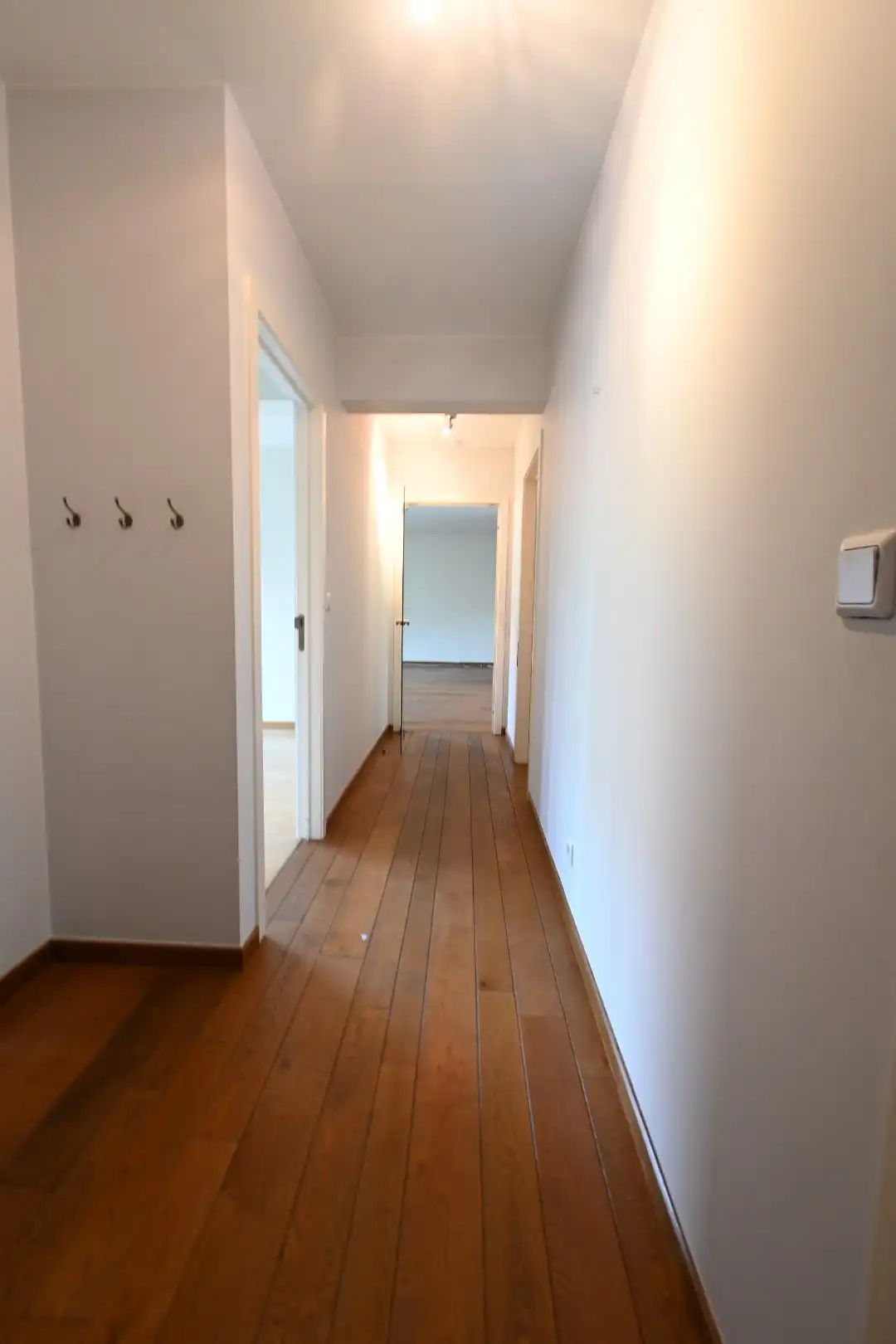 Degelijk 2-slaapkamer gelijkvloersappartement met autostandplaats + in hartje Bilzen foto 23