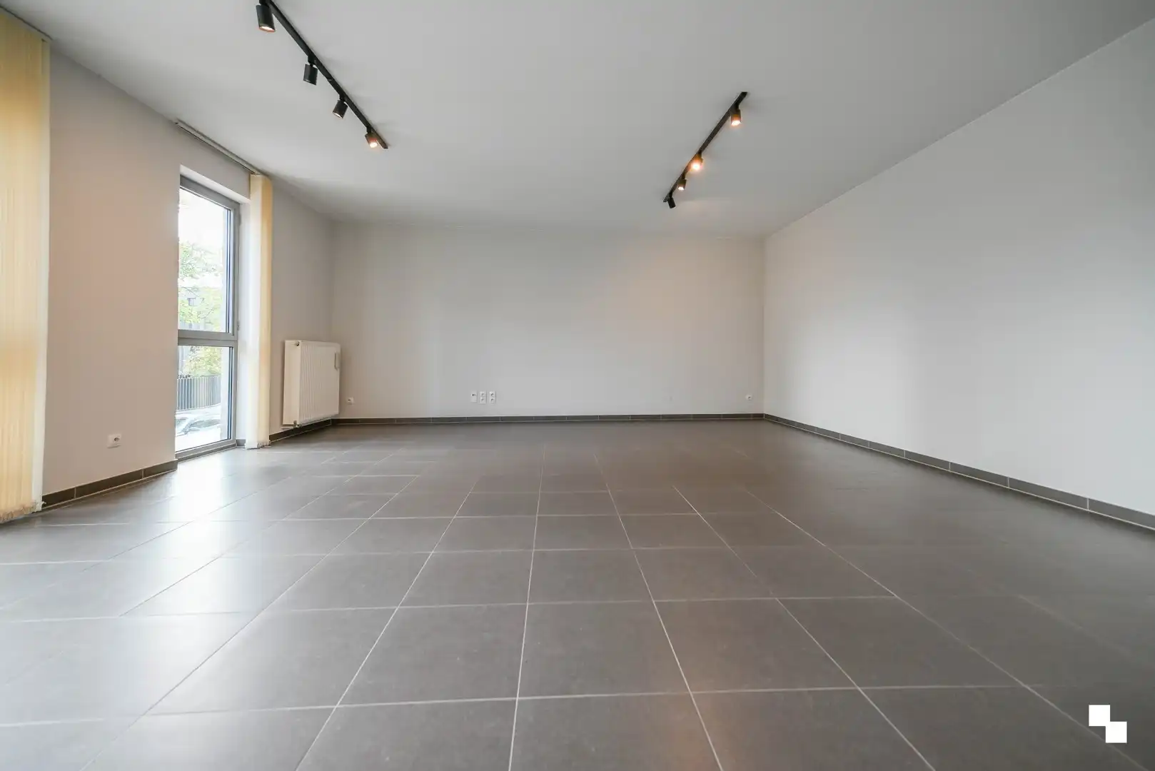 Ruim appartement met drie slaapkamers & garagebox foto 6