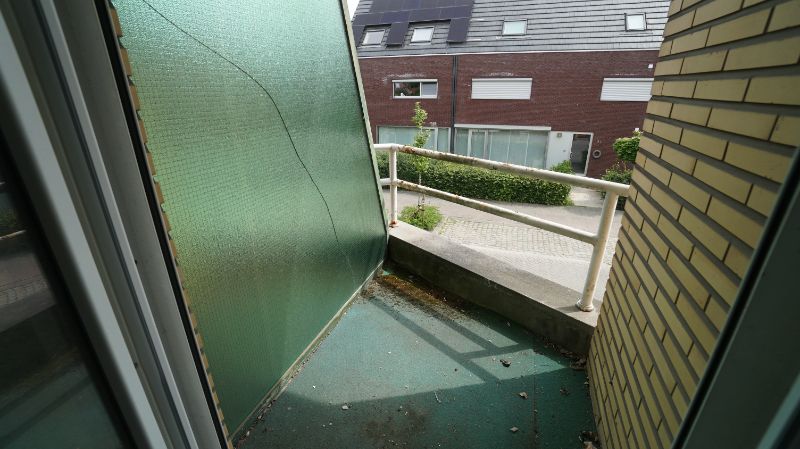 Opbrengsteigendom met 2 verhuurde handelspanden, 1 appartement en 2 garageboxen foto 14