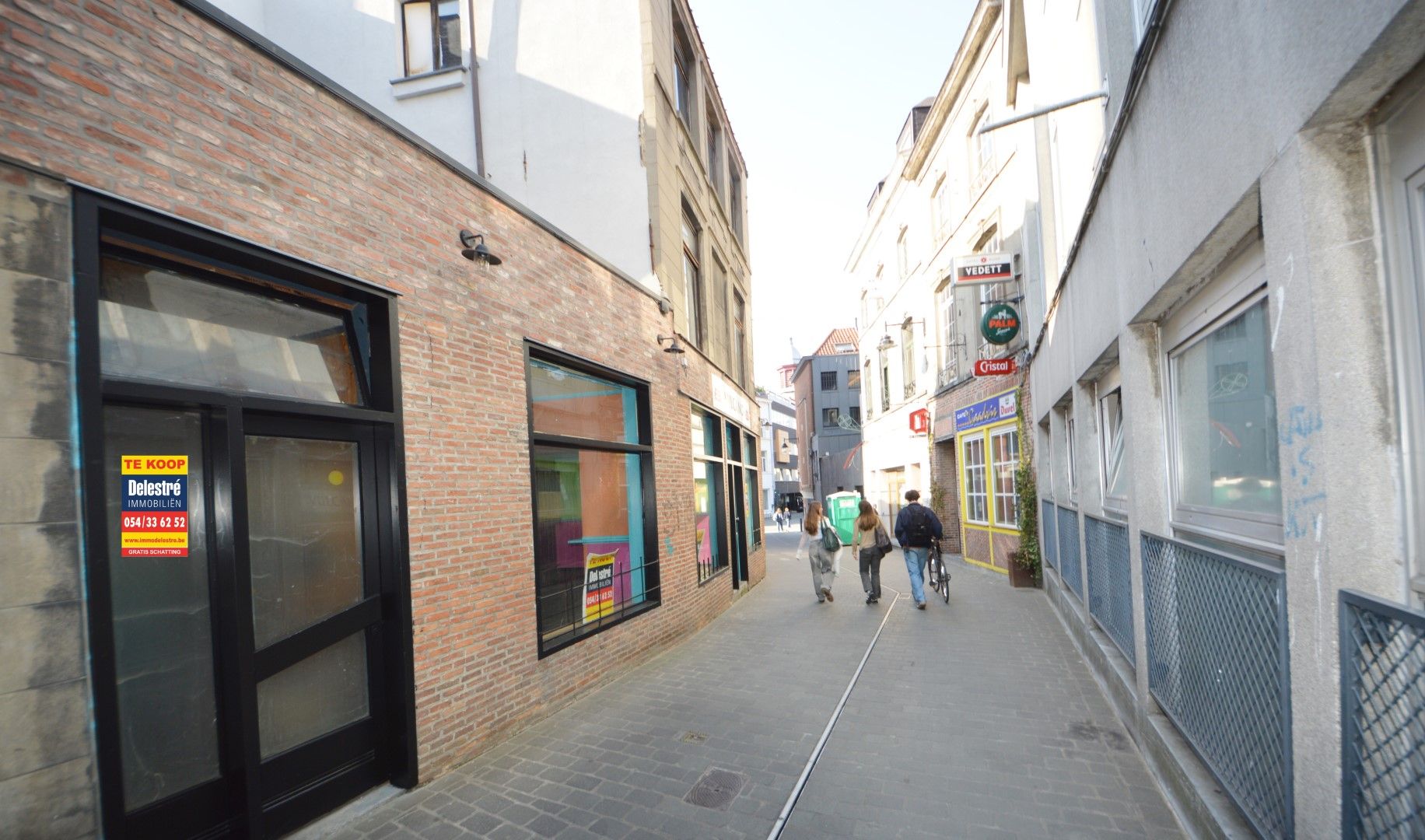 HANDELSEIGENDOM ROZEMARIJNSTRAATJE NABIJ GROTE MARKT foto 2