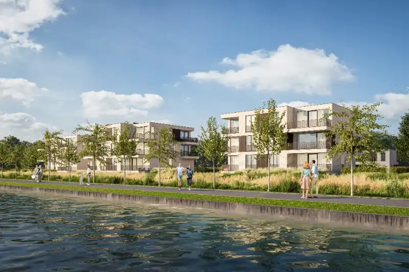 Lichtrijk doorkijkappartement met terras en uitzicht op het water foto 3