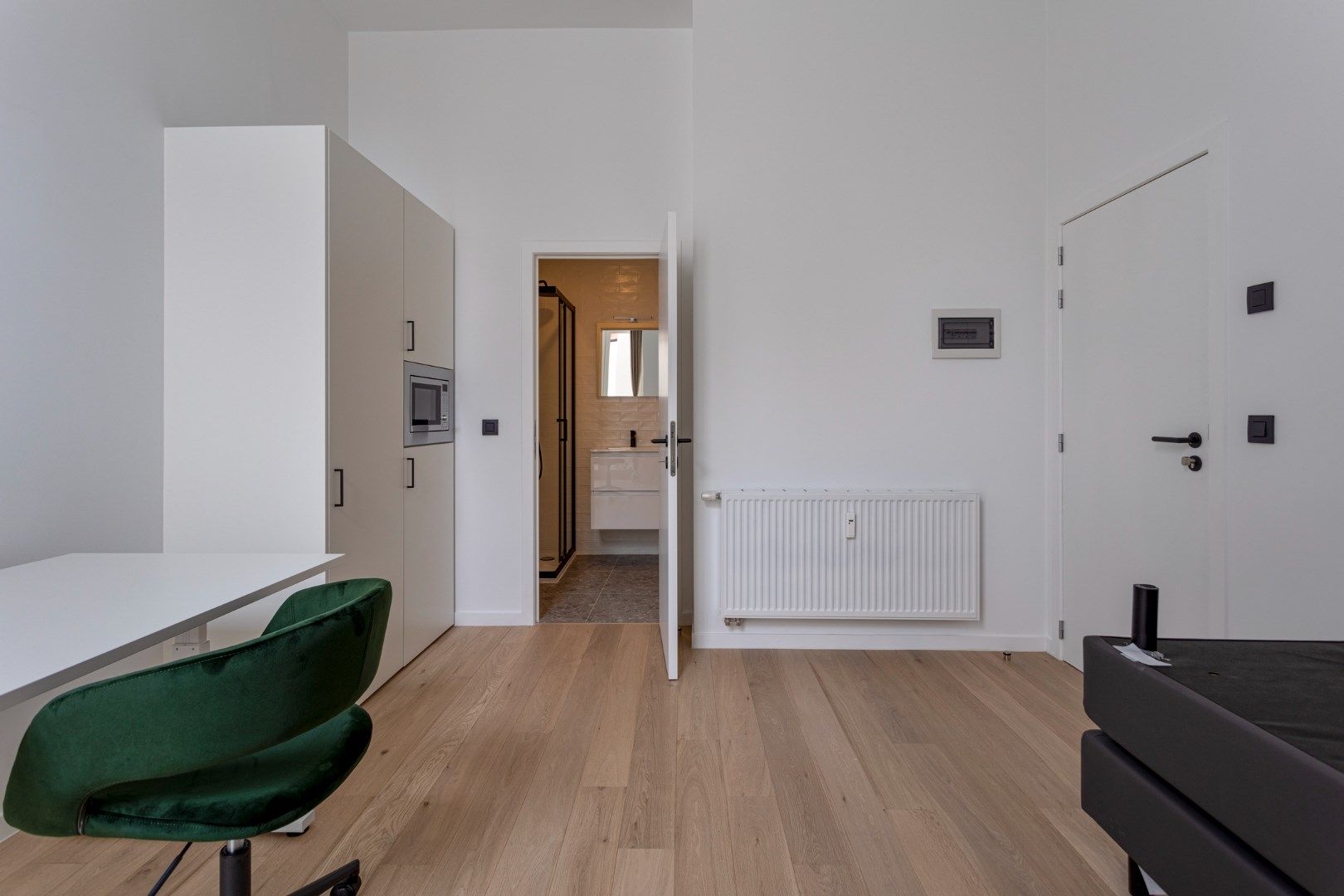 Volledig gerenoveerde studentenkamer in residentie met 29 studentenkamers met eigen sanitair in hartje Leuven  foto 12