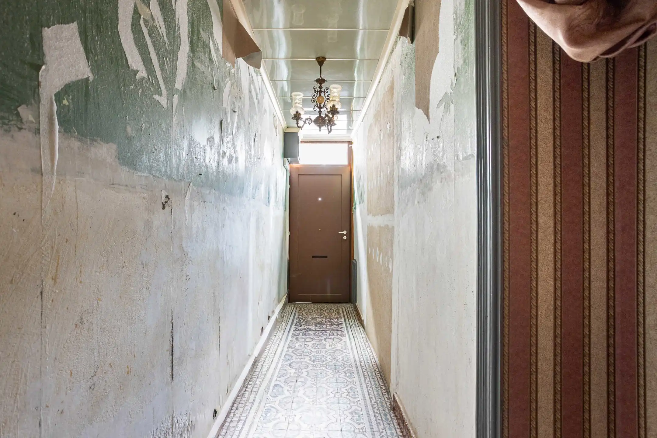 Te renoveren woning met aangename stadstuin foto 12