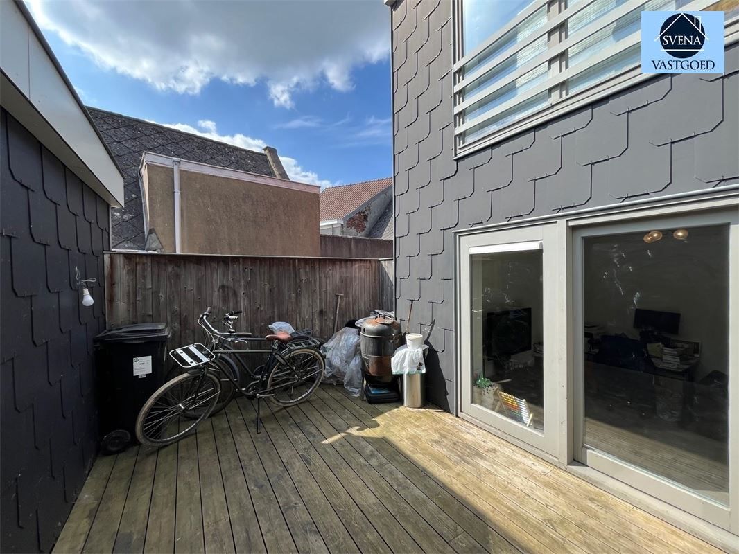 OPBRENGSTEIGENDOM BESTAANDE UIT 1 HANDELSZAAK EN 3 APPARTEMENTEN foto 20