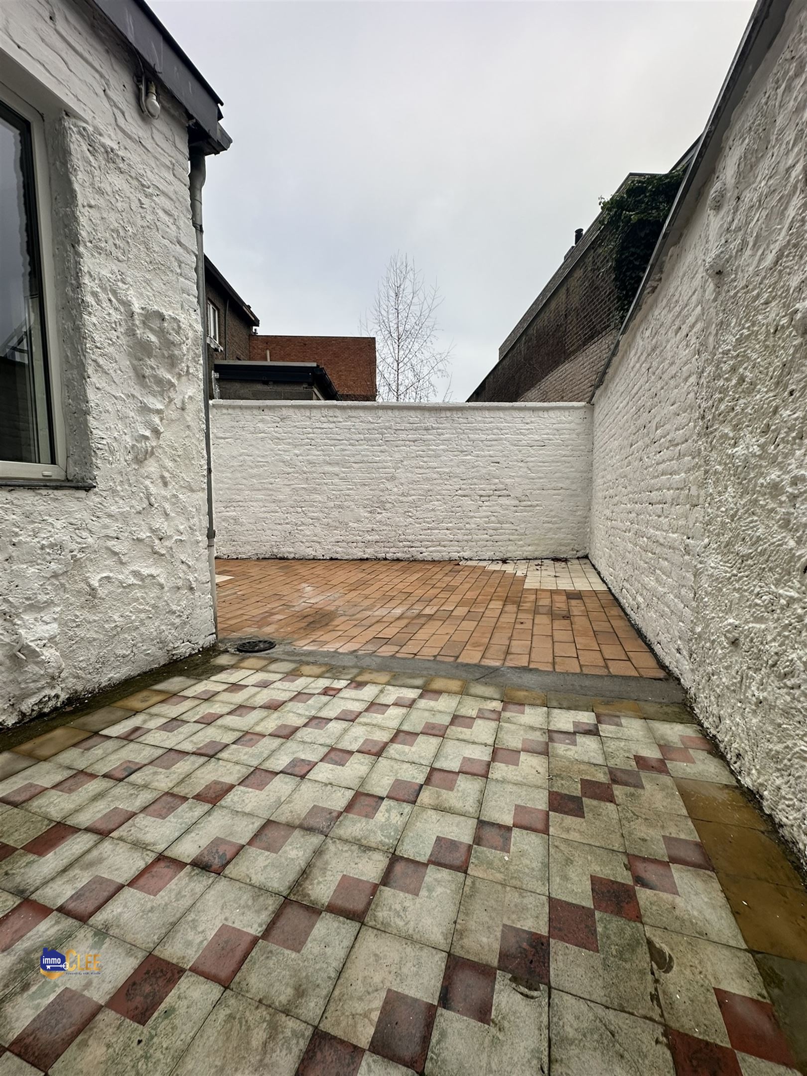 Ruime stadswoning met 3 slpks en koer foto 18