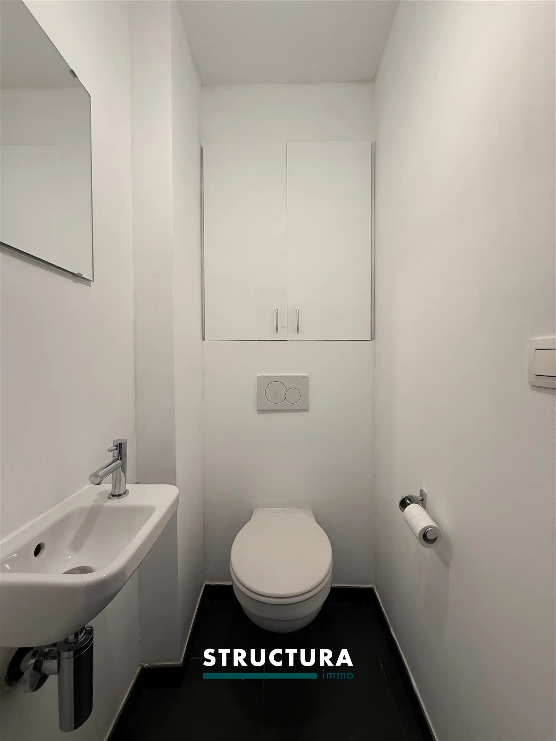 Appartement met ruim terras, staanplaats aan de Markt foto 9