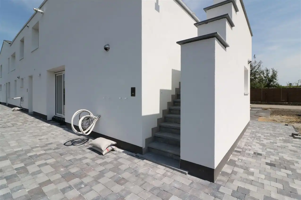Gunstig gelegen, vernieuwd app. met 3 slpk., 2 badk. en garage foto 36