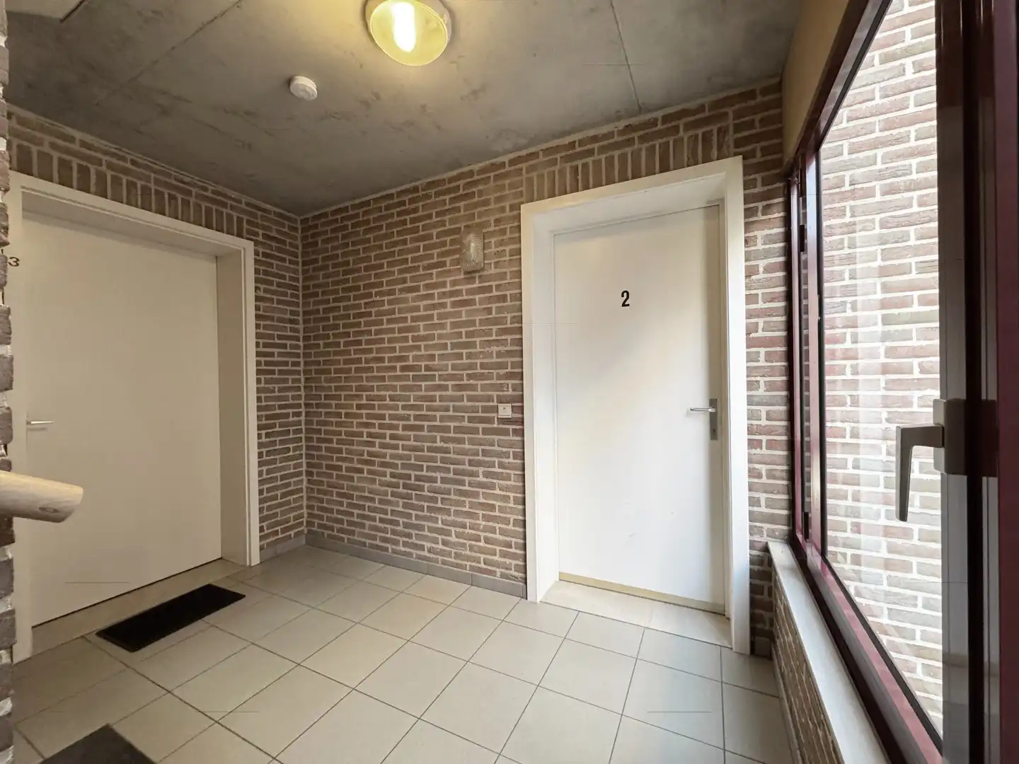 Investering in het Centrum van Borgloon: Appartementenblok met 5 Appartementen en 2 Autostaanplaatsen foto 4