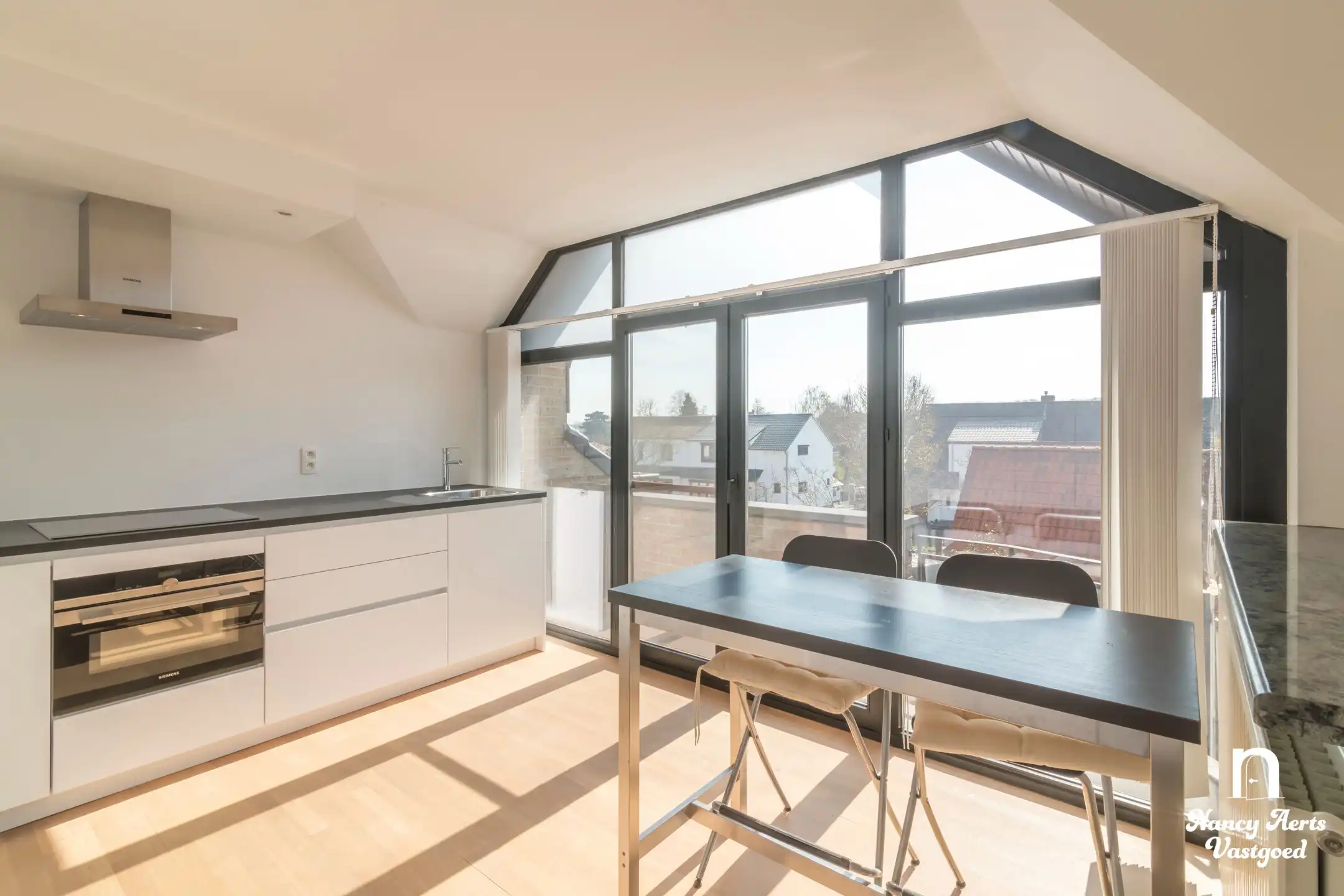 Ruim, lichtrijk appartement met zonnig terras in hartje Paal foto 9