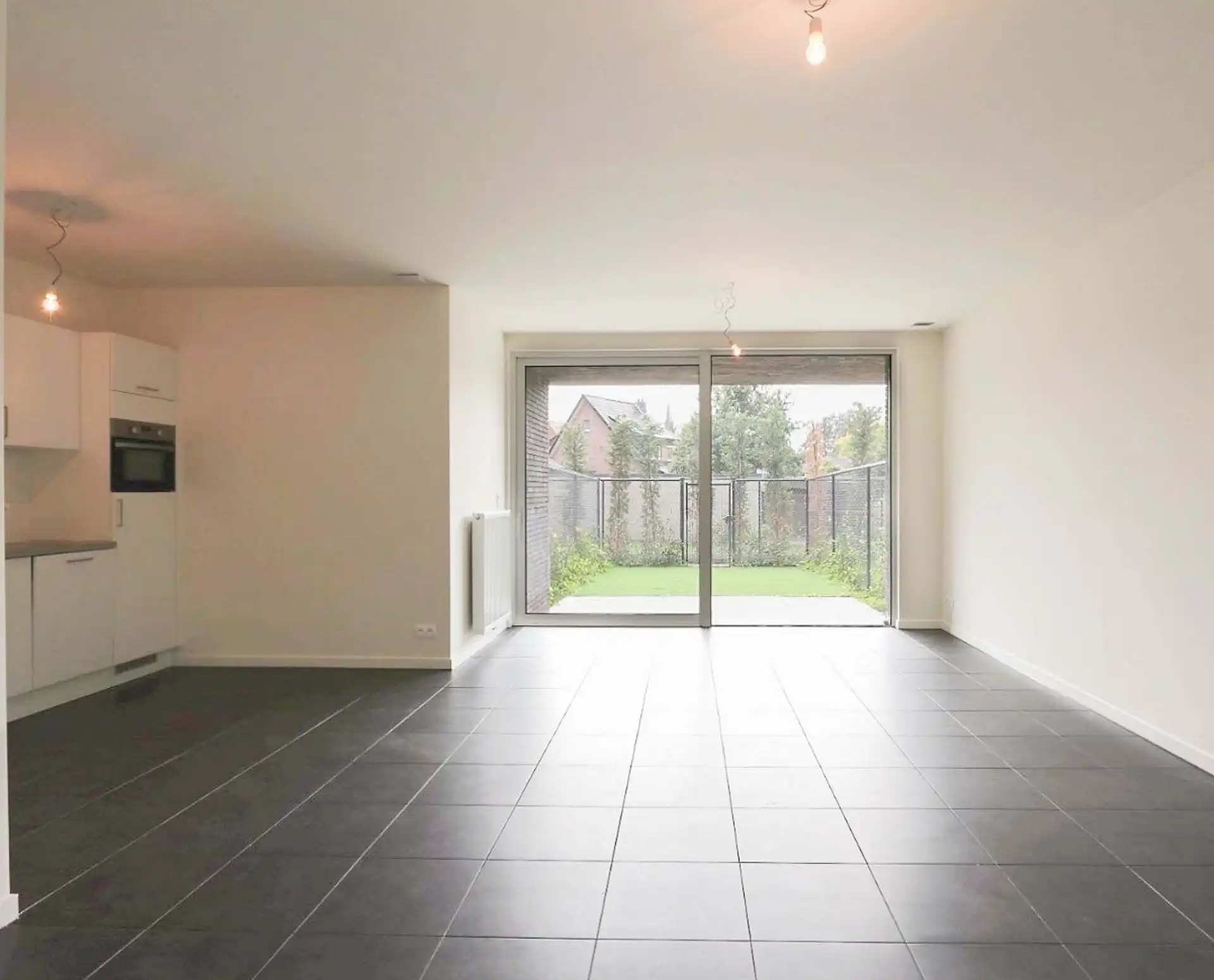 Gelijkvloers appartement met tuin in recent gebouw foto 4