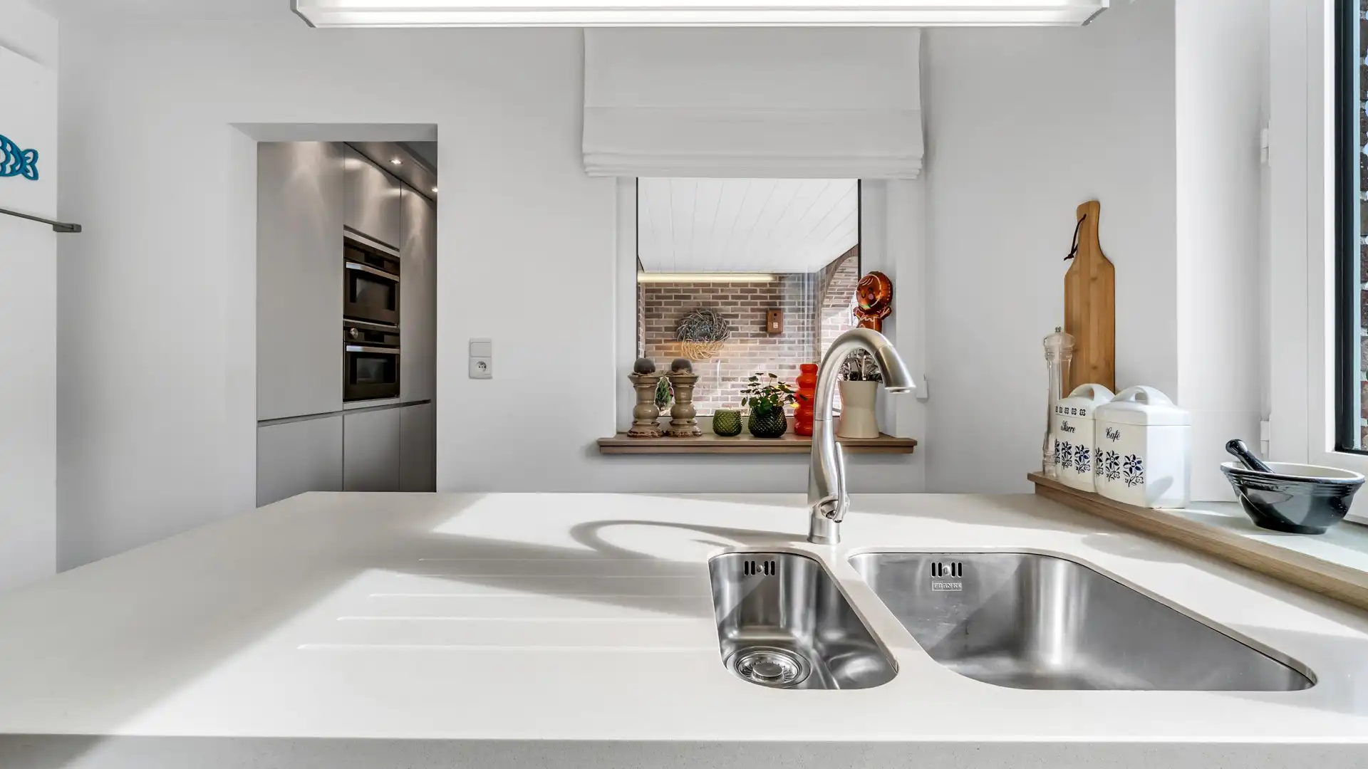 Gerenoveerd en lichtrijk appartement met 2 slkprs in As foto 8