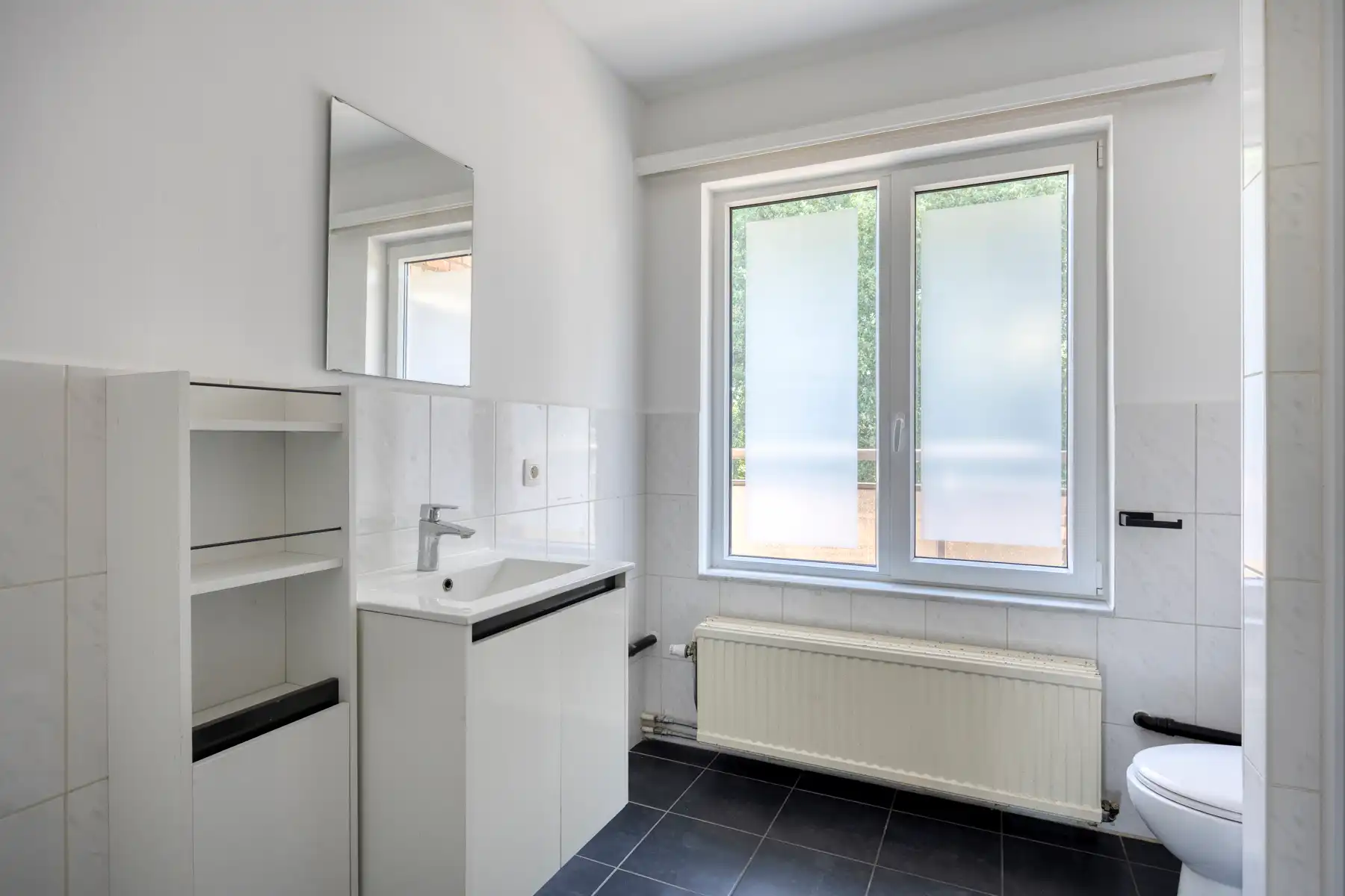 Lichtrijk 2-slaapkamerappartement met terras foto 11