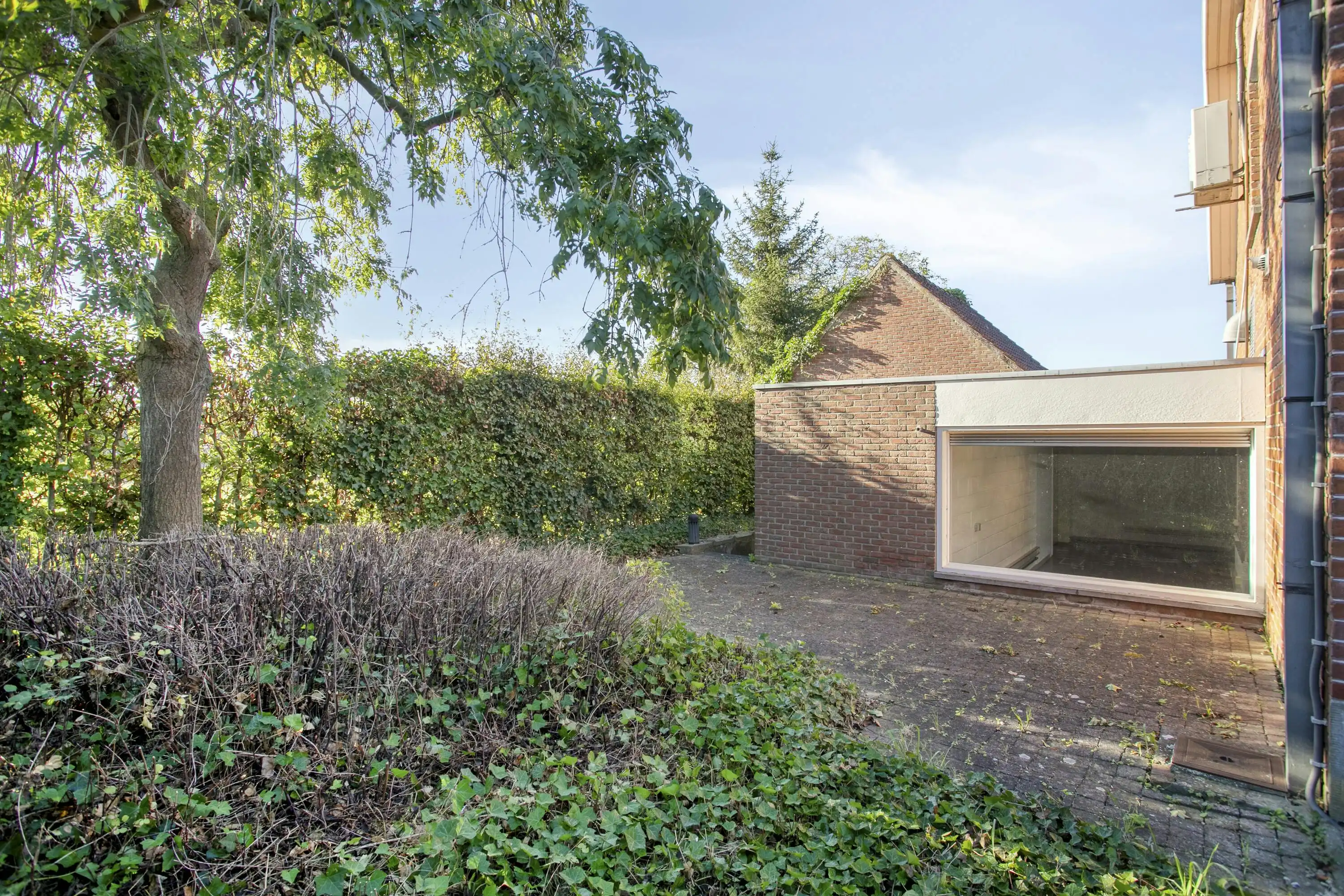 Huis met kantoorruimte en atelier te koop in Waregem foto 11