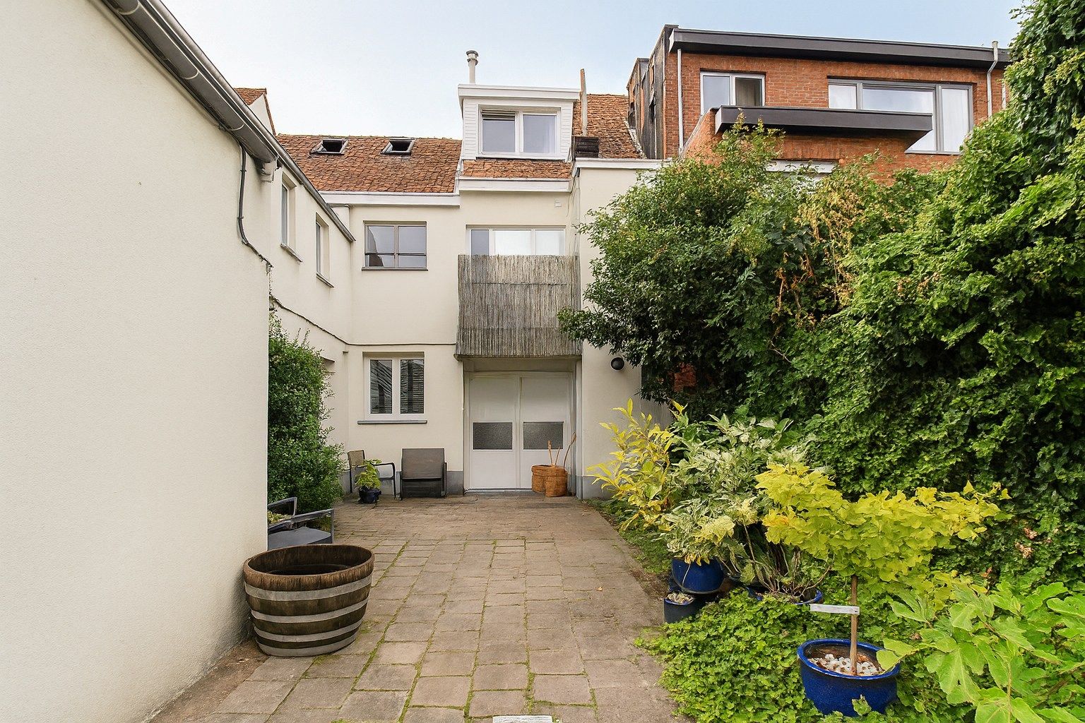 Unieke eigendom met woning, duplexappartement, magazijn en tuin op 508 m² gelegen te Burcht (Zwijndrecht)! foto 15