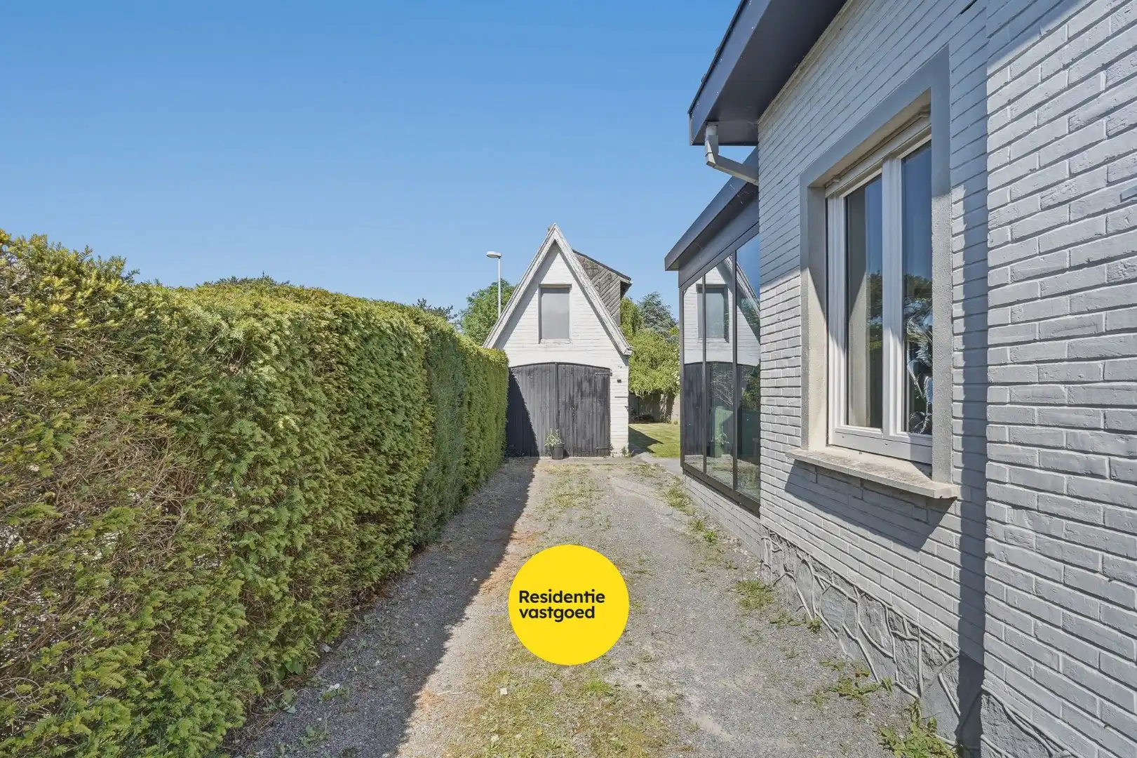 Alleenstaande woning met prachtige uitbouw in centrum Veldegem foto 25