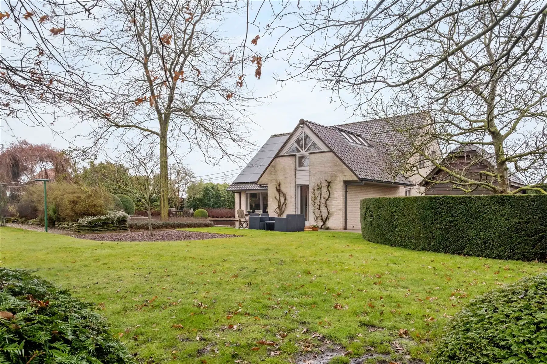 Instapklare en lichtrijke woning met zonnige tuin op 1.304 m² in Ingooigem foto 10