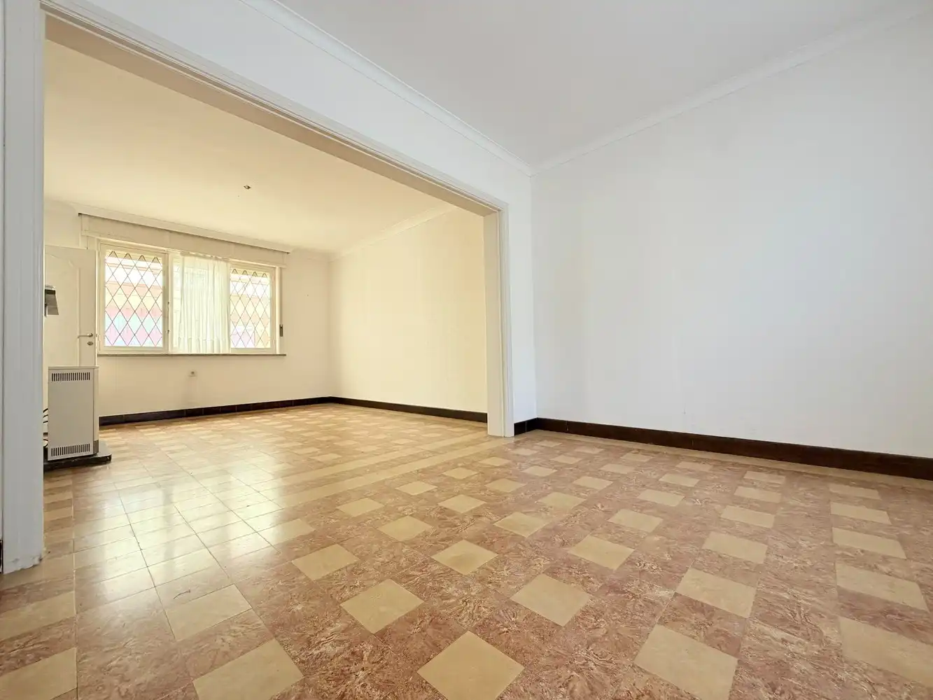 Te renoveren woning in het Centrum van Torhout foto 3