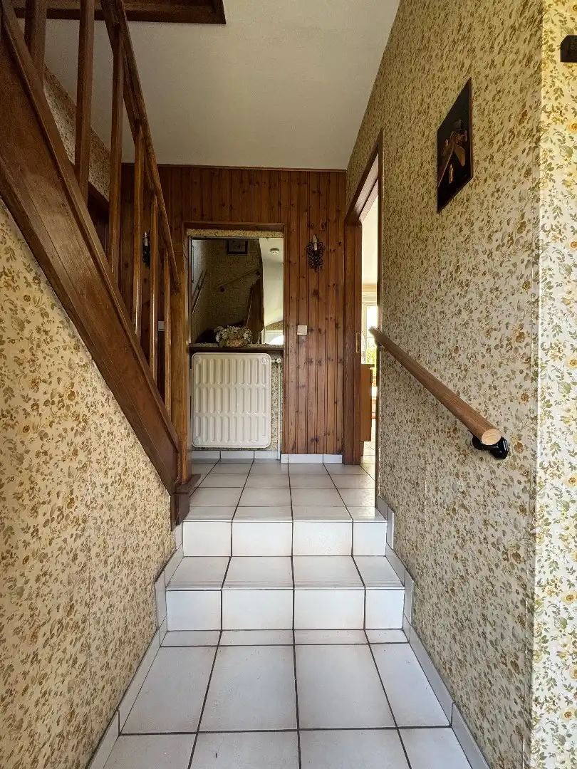 Charmante 3-gevelwoning met garage en tuin foto 8