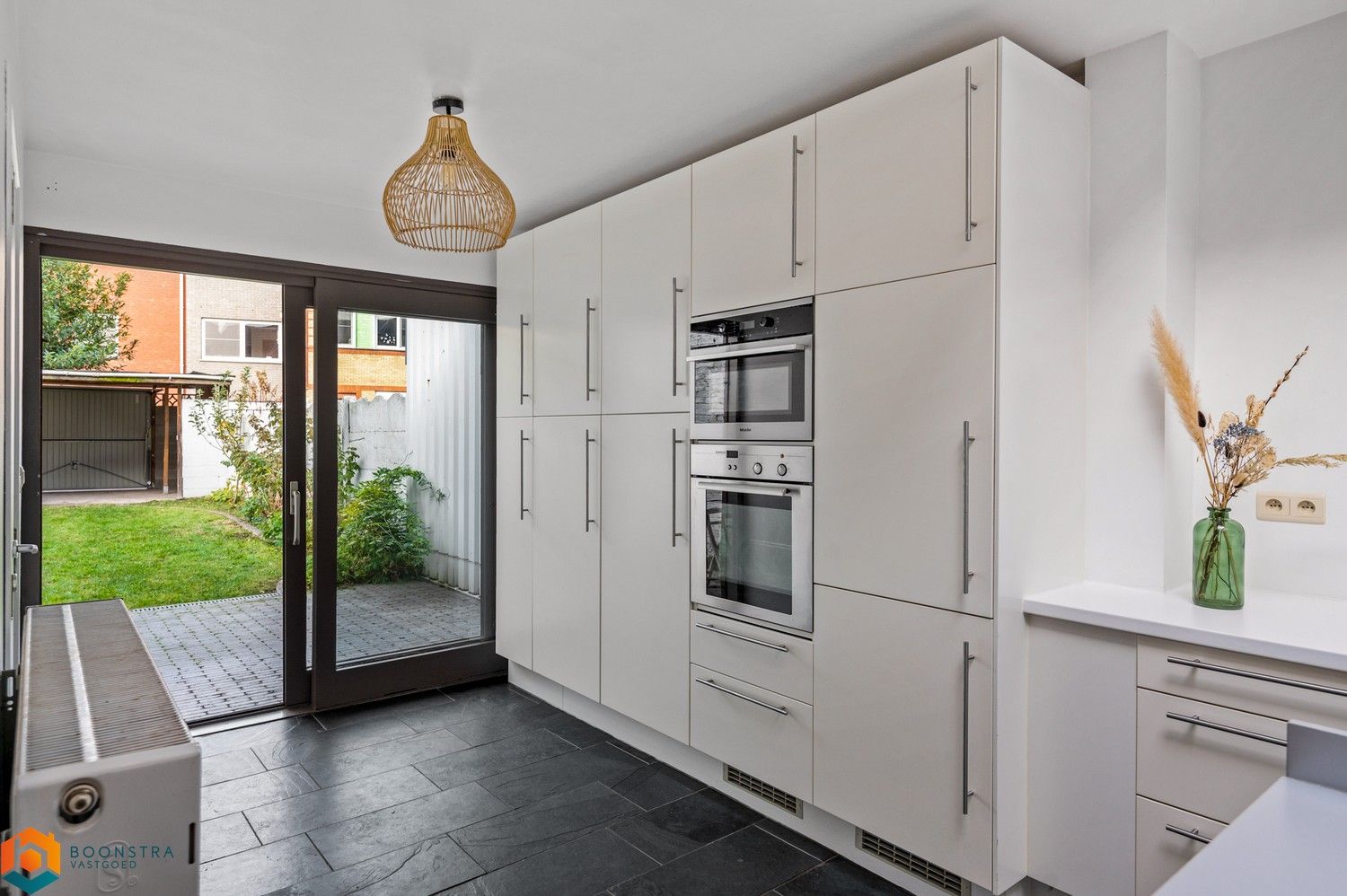 Gerenoveerde gezinswoning met 3 slpkrs en tuin in Mechelen foto 8