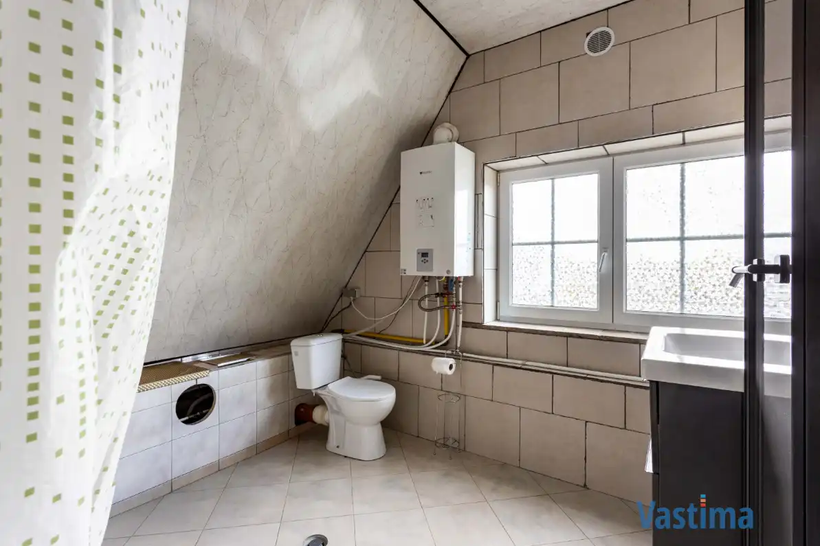 Rustige gelegen gezinswoning met tuin foto 17