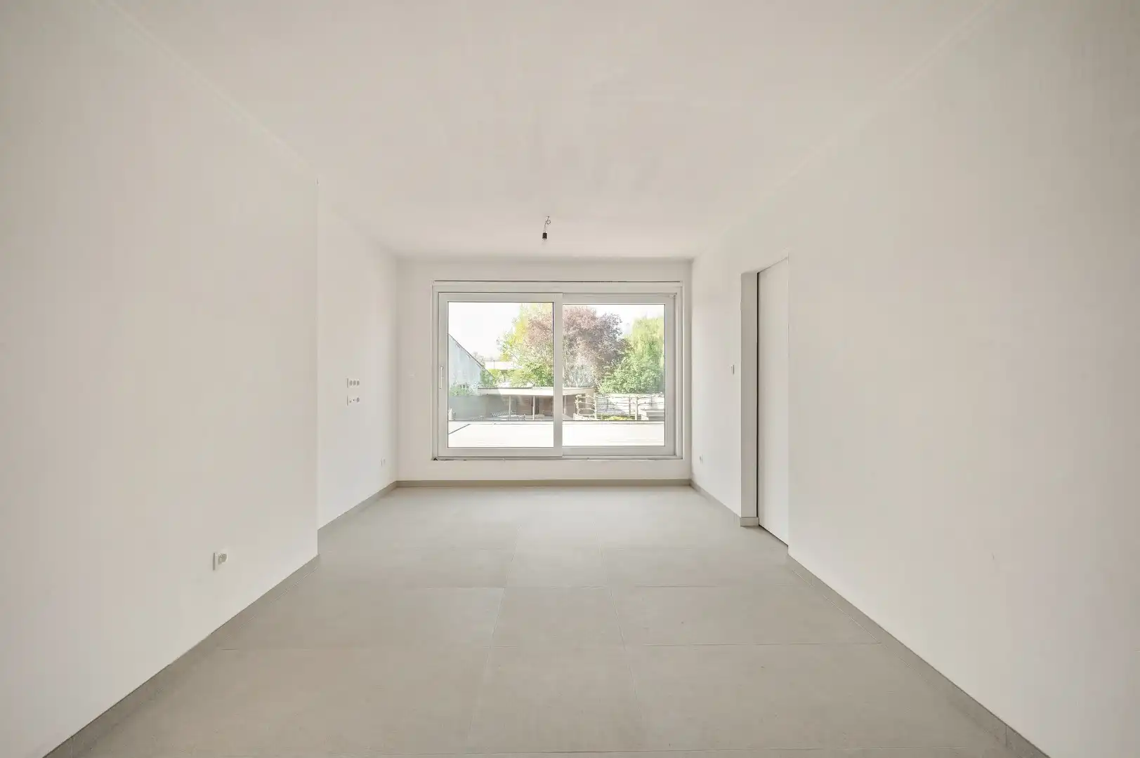 DUPLEX NIEUWBOUWAPPARTEMENT MET 2 SLPKS EN RUIM TERRAS TE GELUWE foto 7