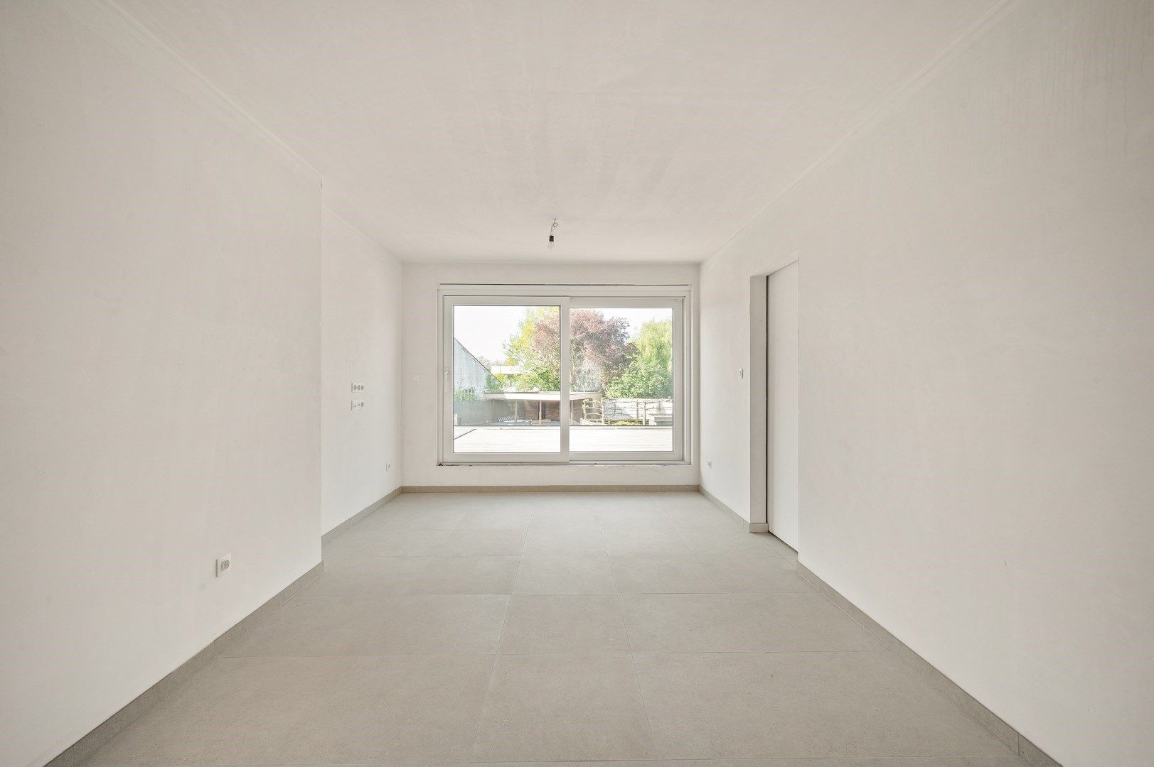 DUPLEX NIEUWBOUWAPPARTEMENT MET 2 SLPKS EN RUIM TERRAS TE GELUWE foto 6